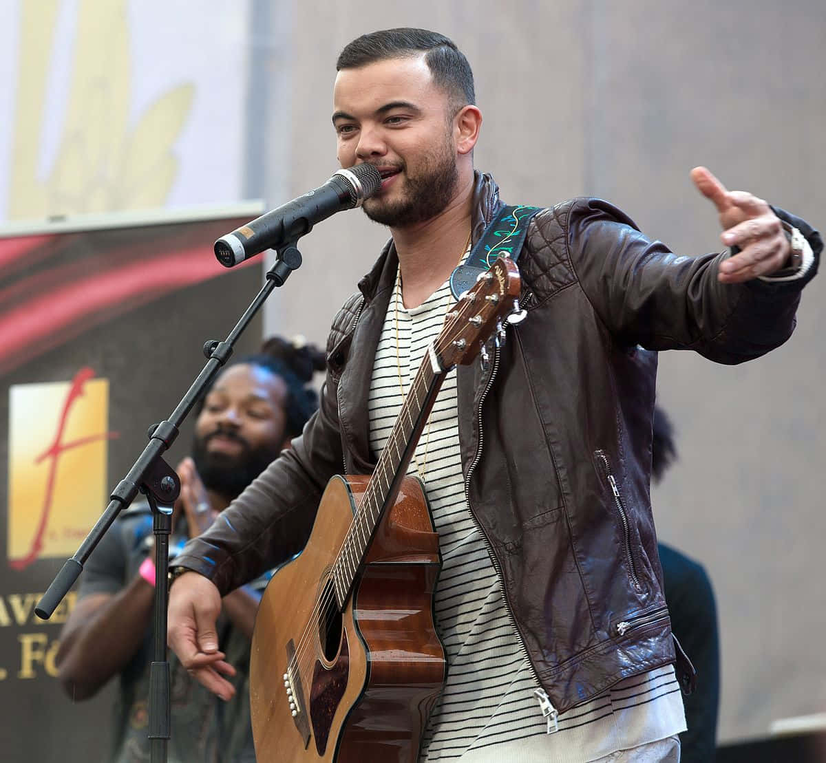 Guy Sebastian, leather jacket, acoustic guitar, SD Desktop Wallpaper