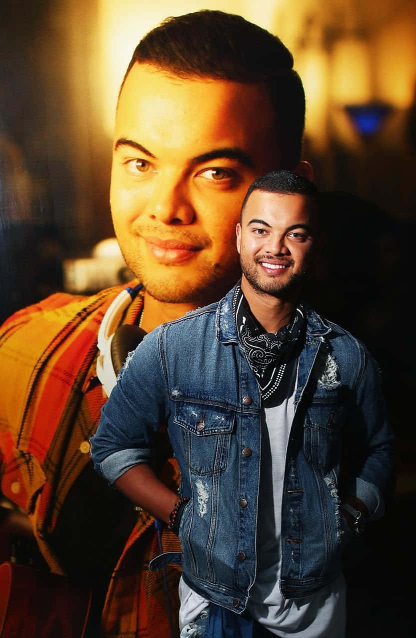 Guy Sebastian, denim jacket, warm-toned portrait, SD Phone Wallpaper