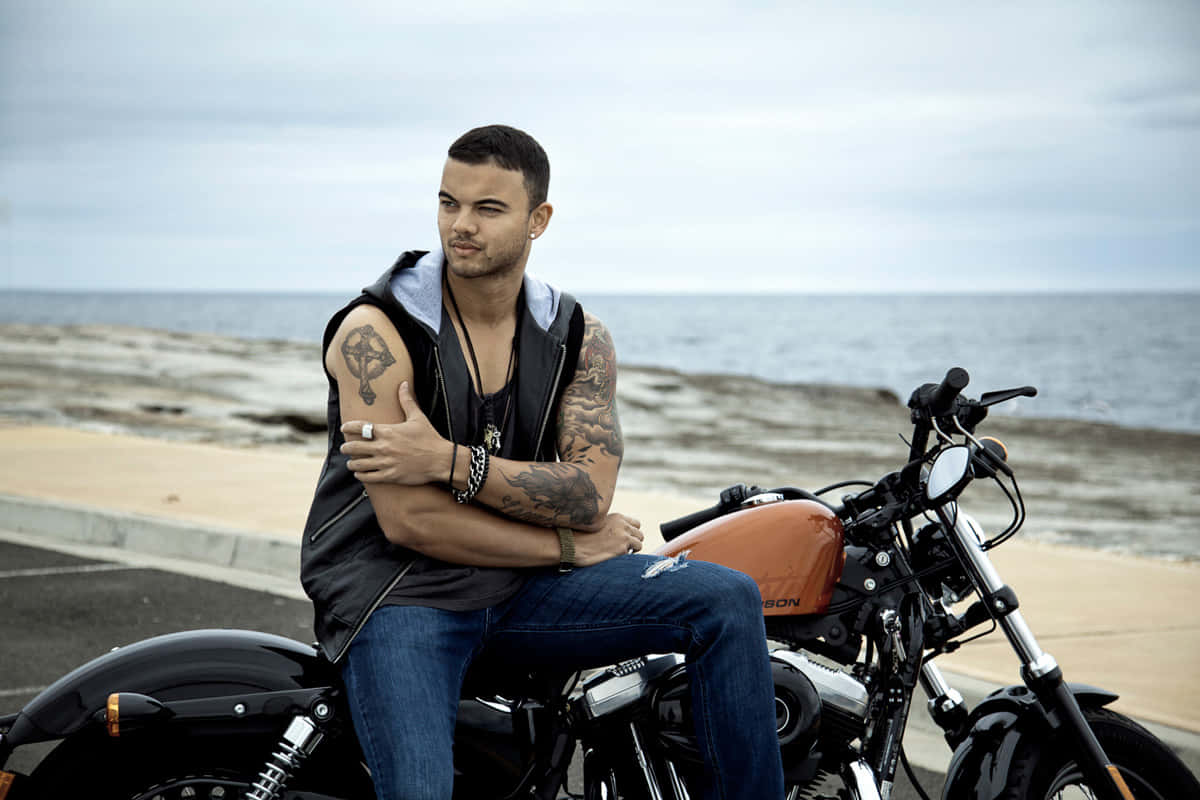 Guy Sebastian, black and orange motorcycle, ocean, SD Desktop Wallpaper