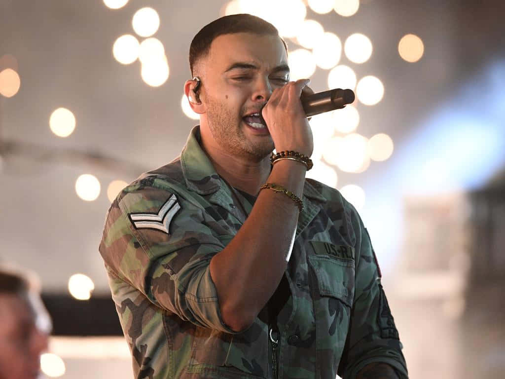 Guy Sebastian, camouflage uniform, microphone, SD Desktop Wallpaper