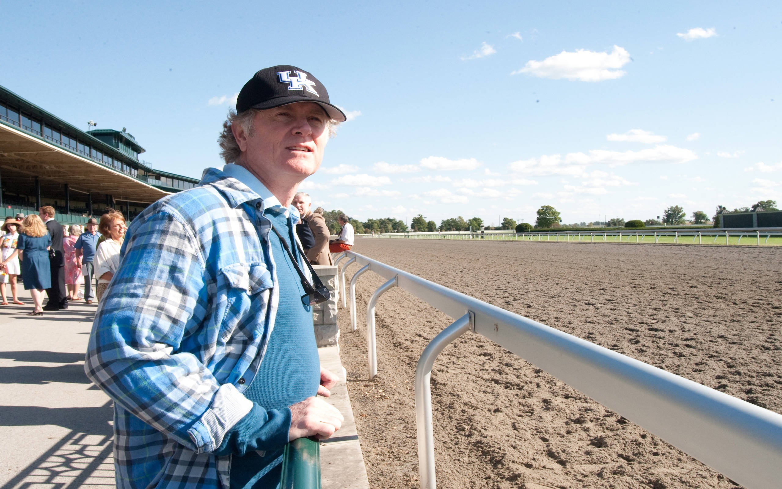 Secretariat, blue plaid shirt, black cap, 2K Desktop Wallpaper