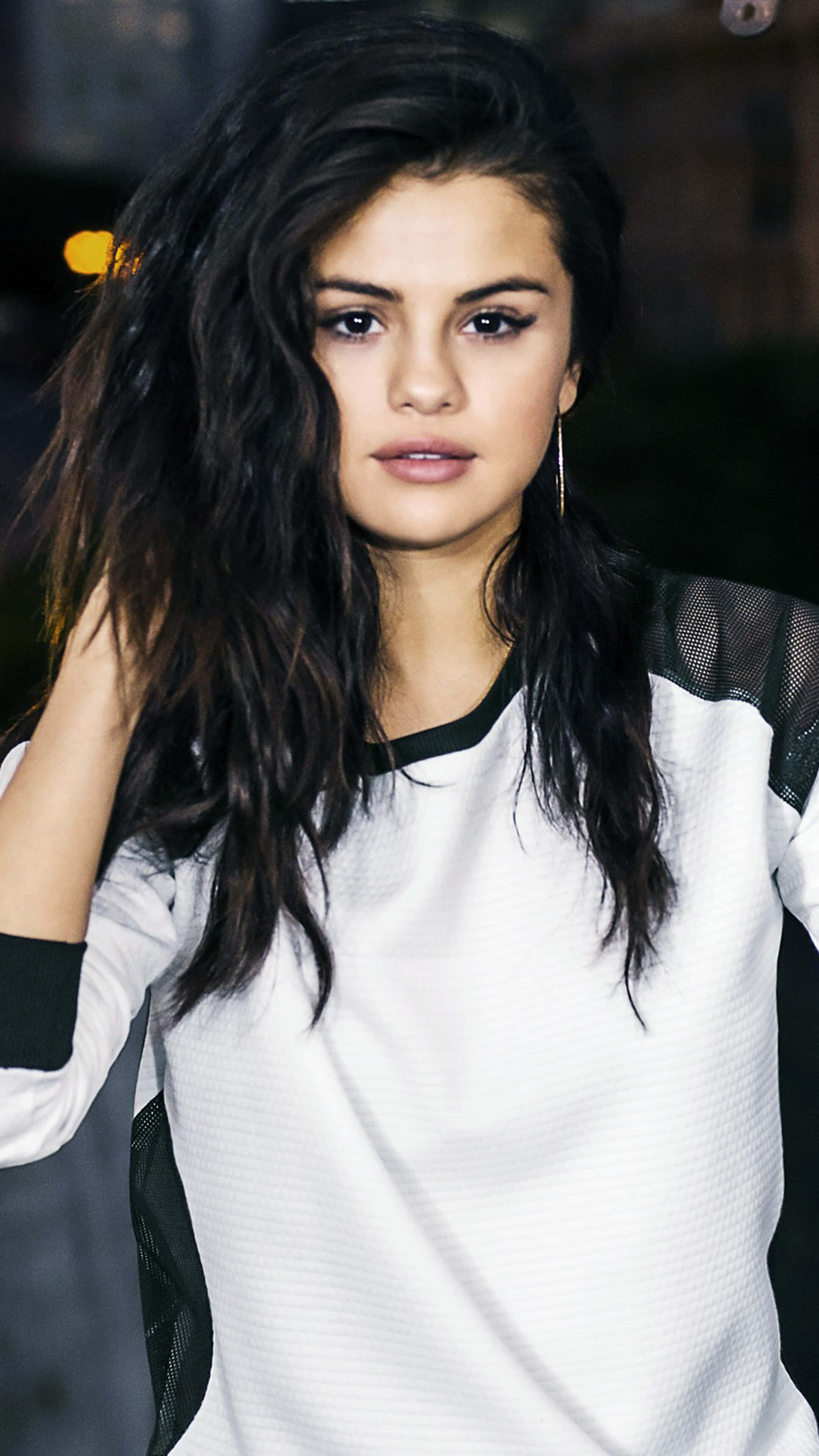 Selena Gomez, iPhone, urban night scene, 4K Phone Wallpaper