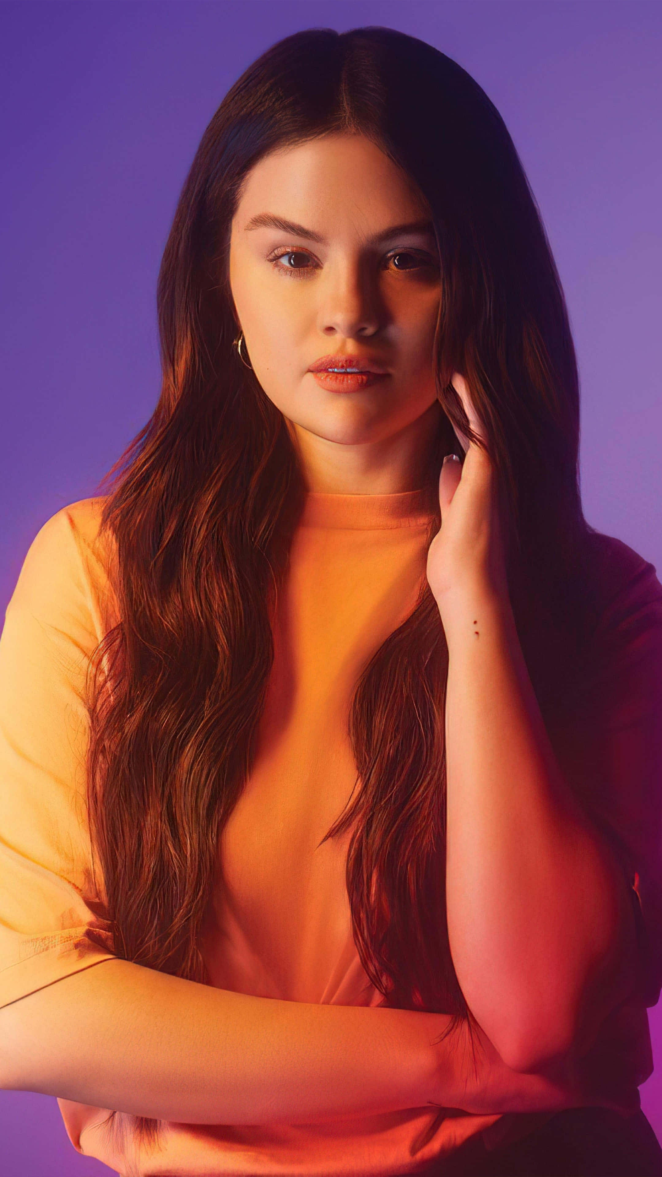 Selena Gomez, iPhone, orange top, 4K Phone Wallpaper