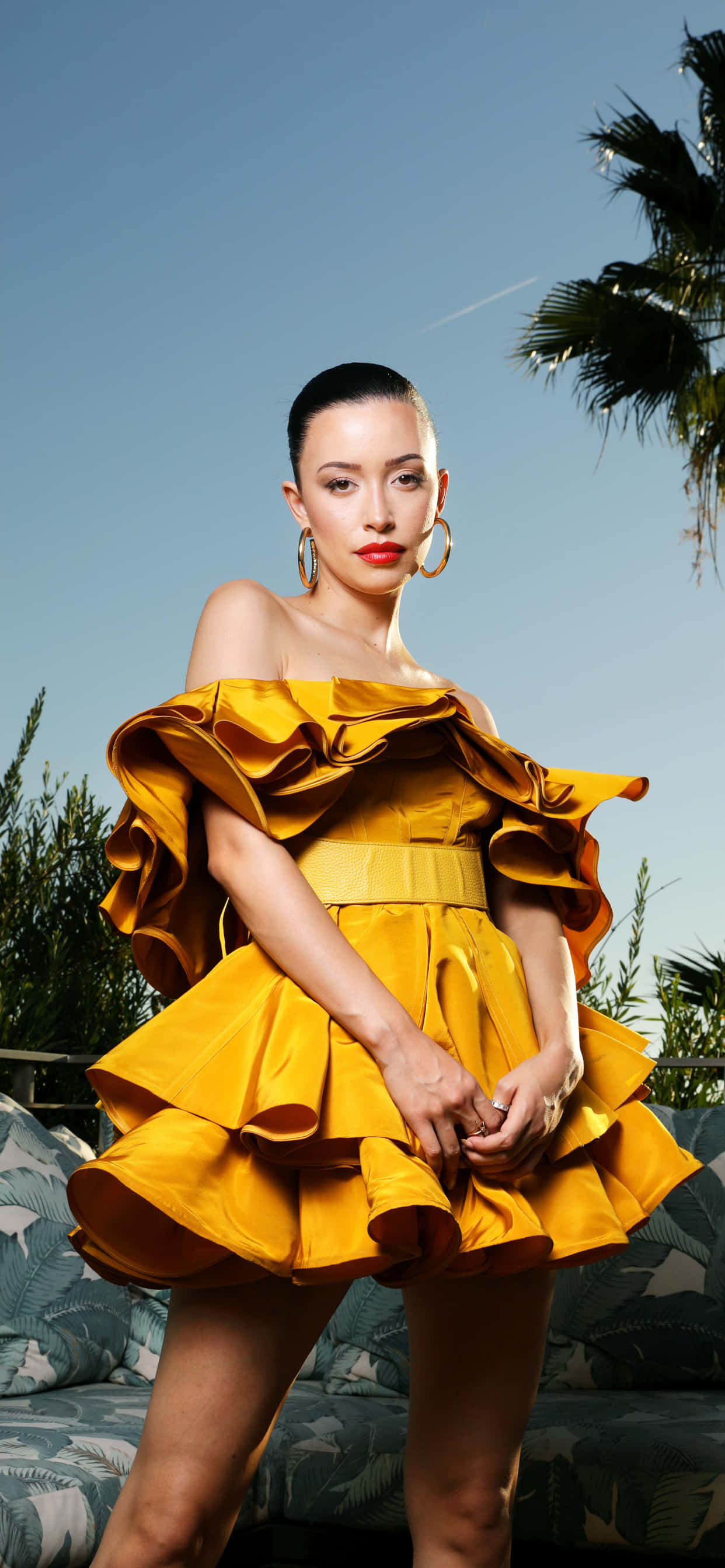 Selena Quintanilla, iPhone 1242 x 2687, bold yellow ruffled dress, 2K Phone Wallpaper
