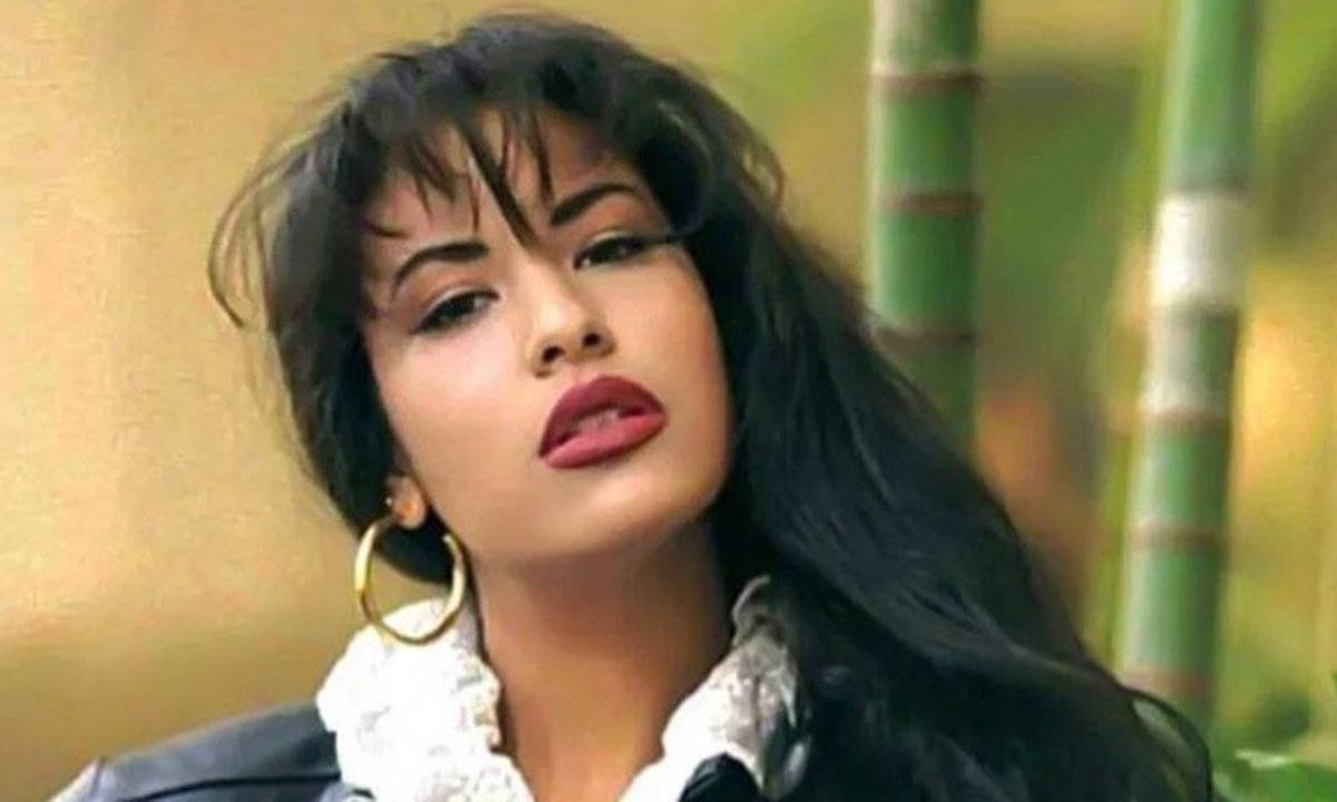 Selena Quintanilla, green bamboo stalks, bold red lips, SD Desktop Wallpaper