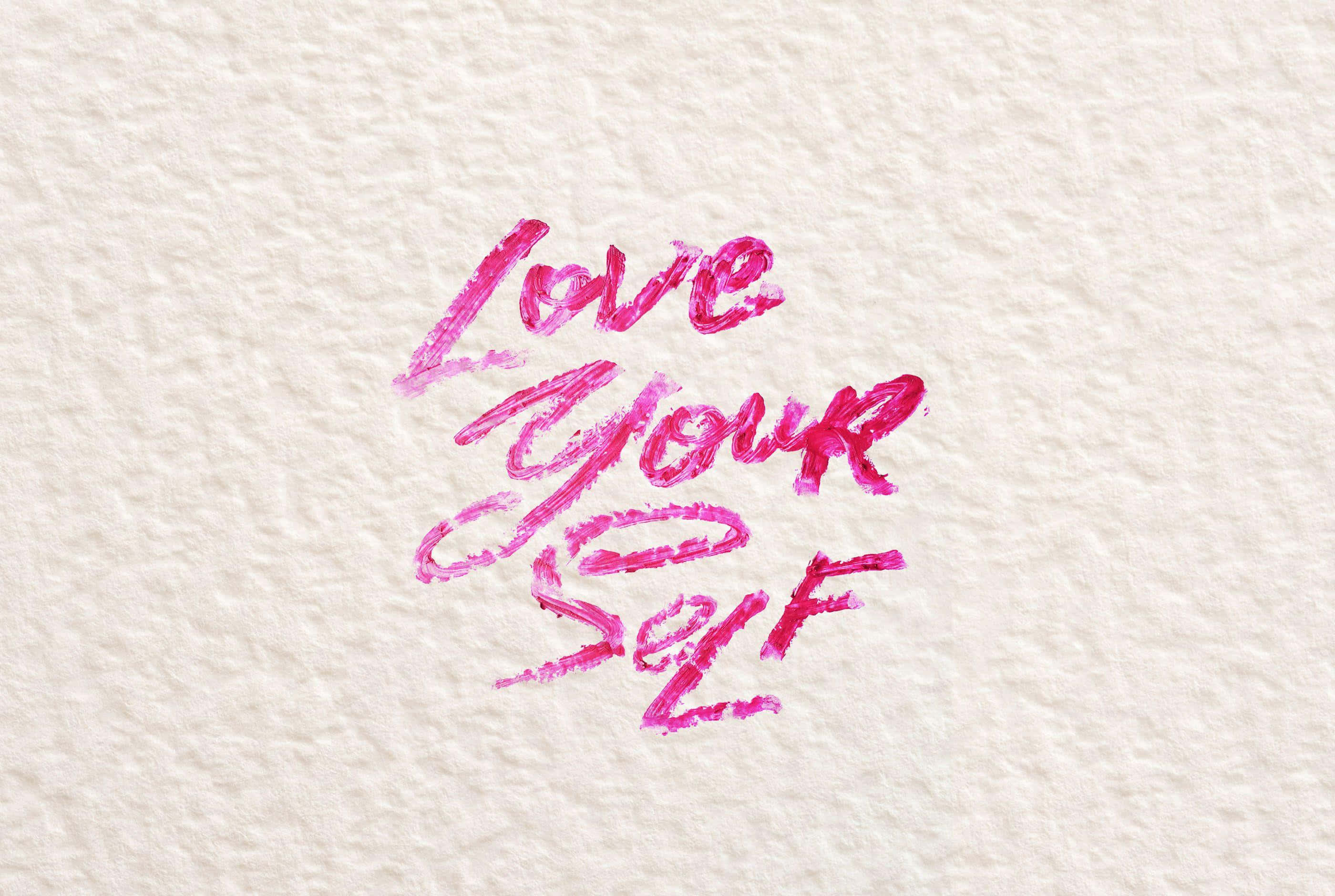 Love Your Self, pink brush-stroke text, textured cream paper, 2K Desktop Wallpaper