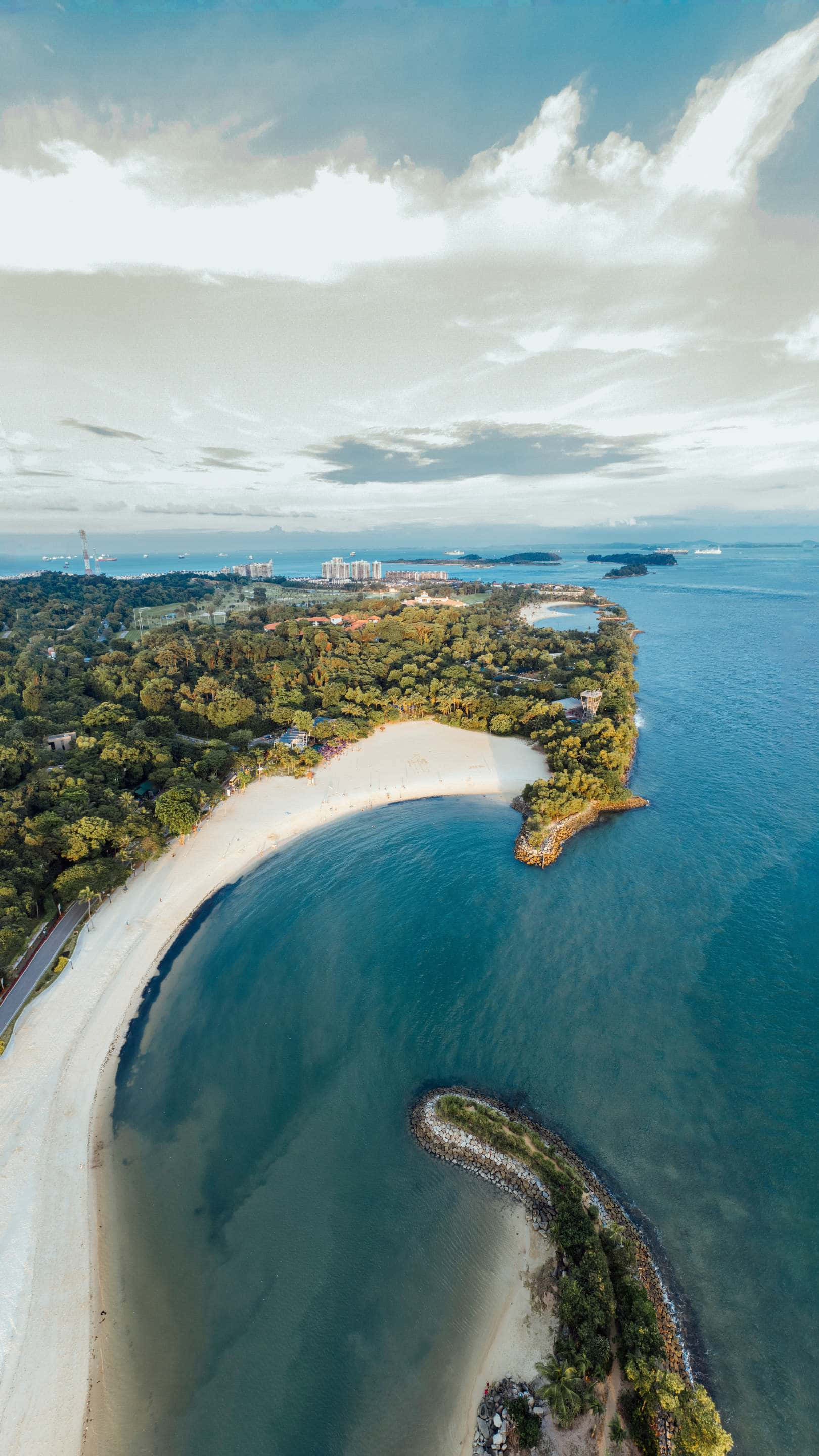 Sentosa Island, crescent-shaped beach, turquoise waters, 2K Phone Wallpaper