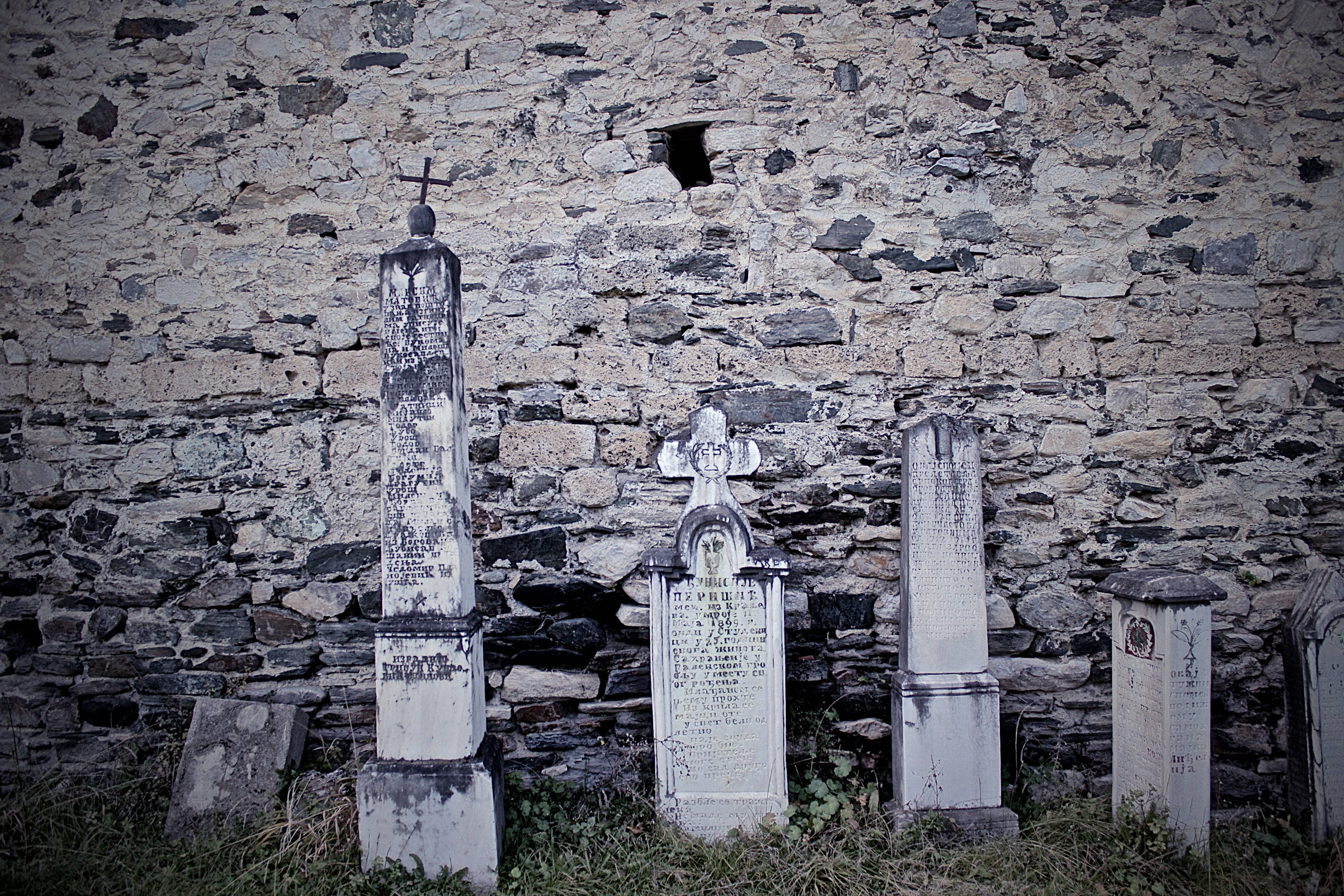 Serbia, old thumb stones, crumbling stone wall, 2K Desktop Wallpaper