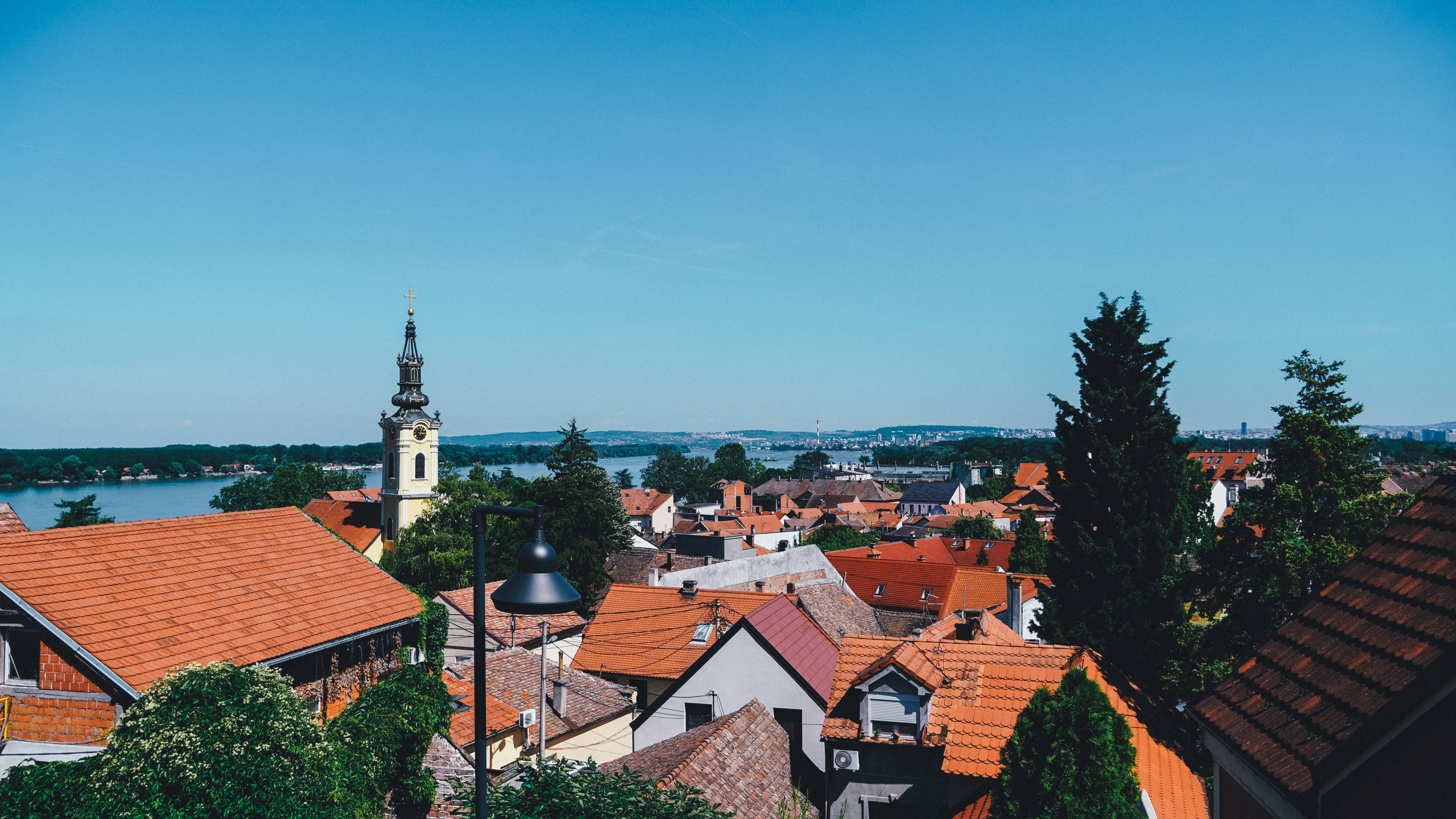 Serbia, blue sky, terracotta roofs, 5K Desktop Wallpaper