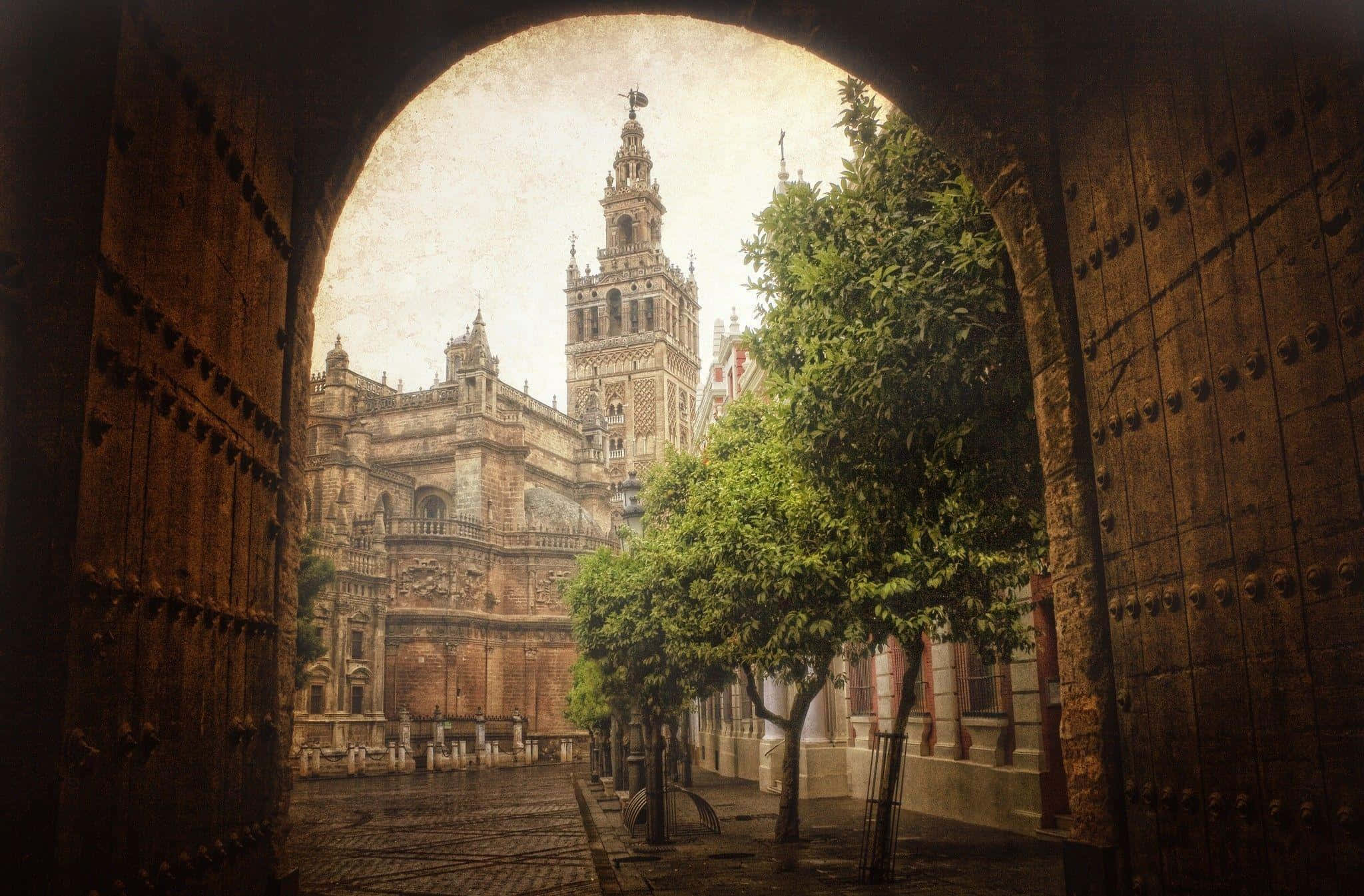 Seville Cathedral, stone archway, tall bell tower, Full HD Desktop Wallpaper
