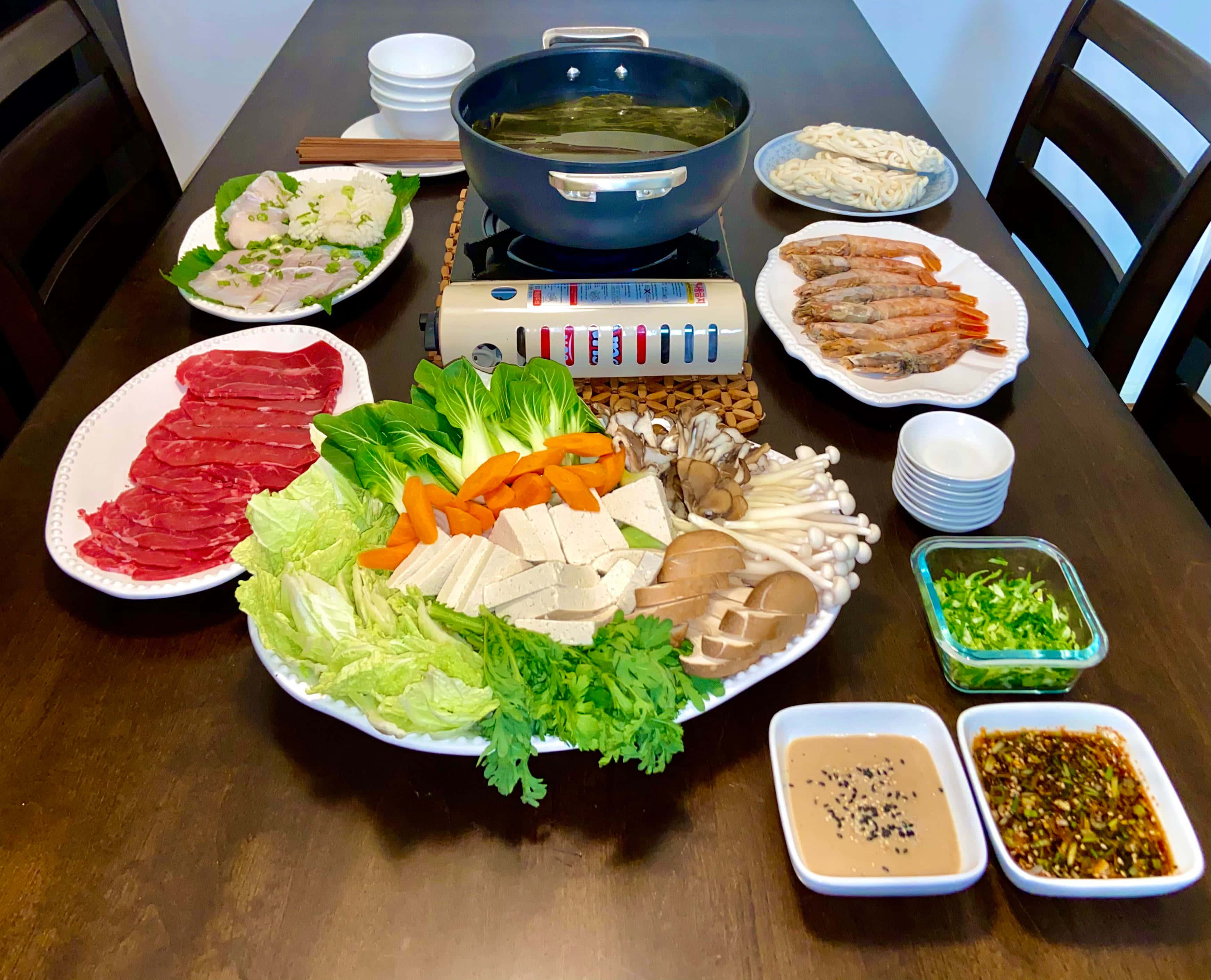Shabu-shabu, wooden table, vibrant ingredients, 2K Desktop Wallpaper