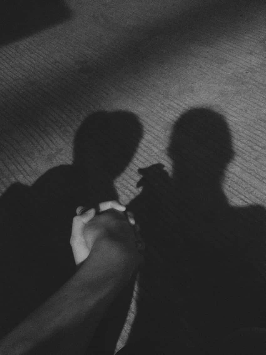 Shadow PFP, silhouetted figures, textured floor, SD Phone Wallpaper