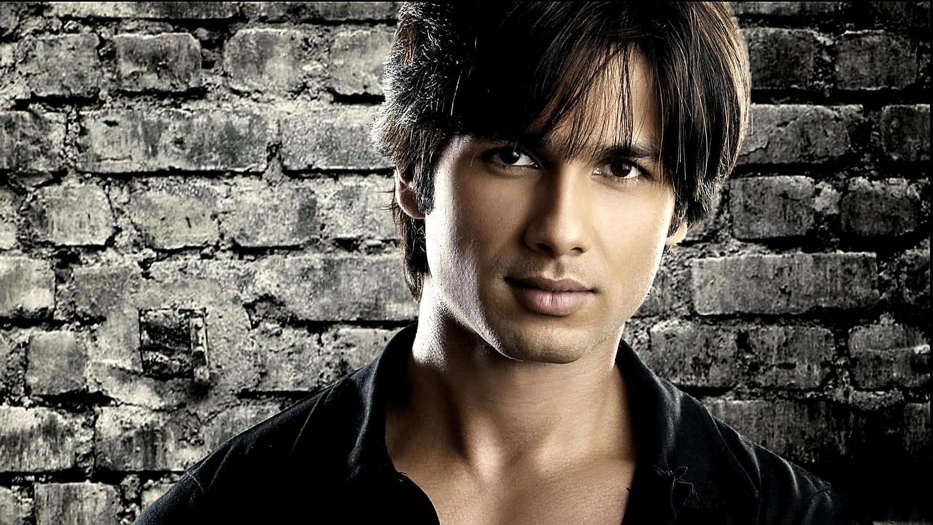 Shahid Kapoor, dark hair, weathered gray brick wall, Full HD Desktop Wallpaper