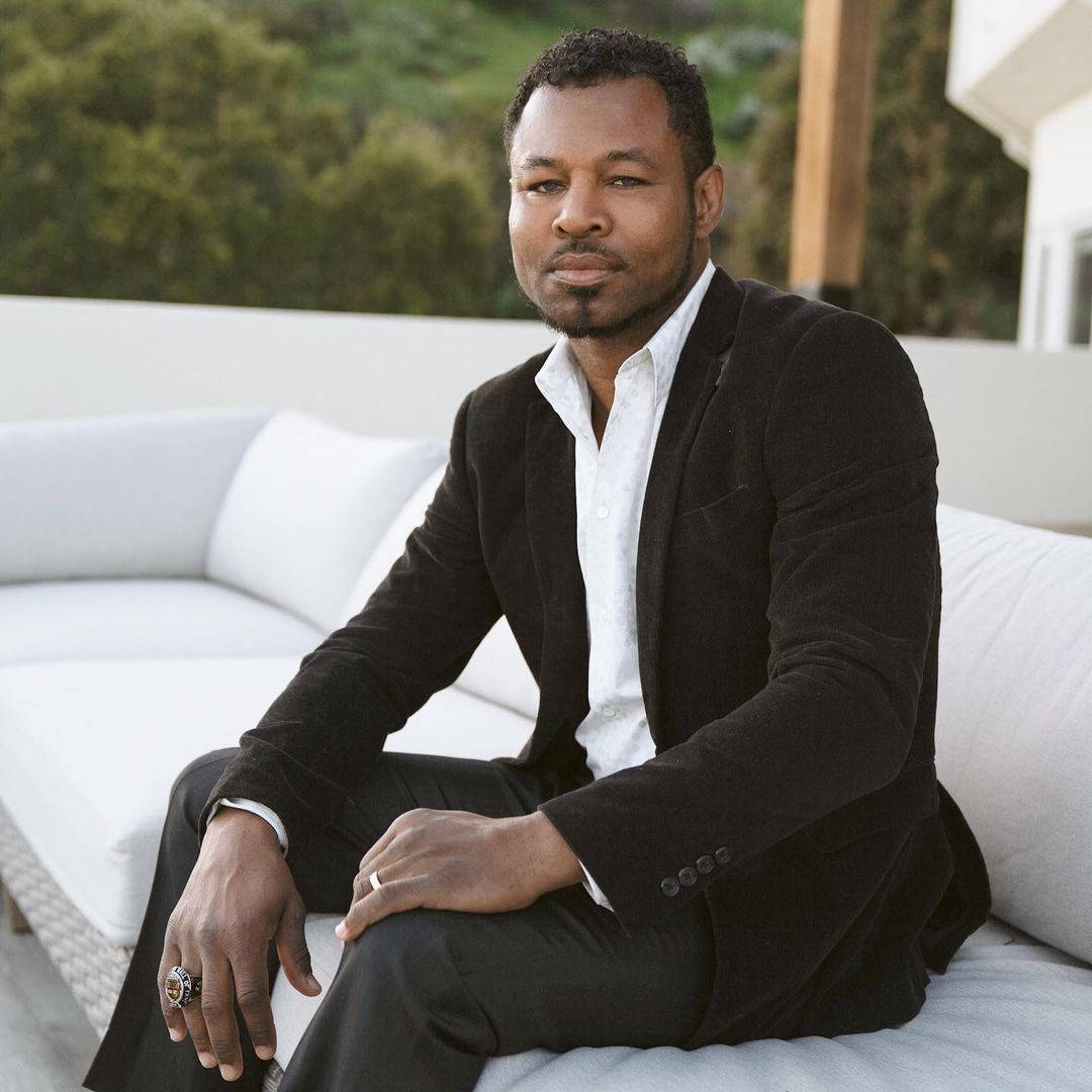 Shane Mosley, black velvet suit, white outdoor sofa, SD Desktop Wallpaper