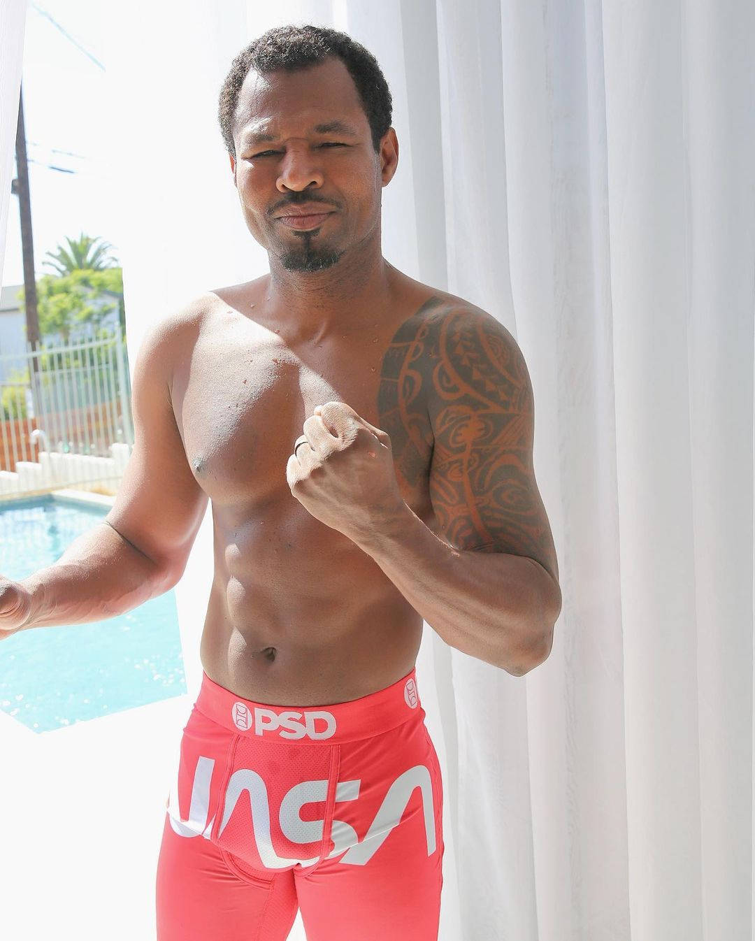 Shane Mosley, red NASA shorts, pool, HD Phone Wallpaper
