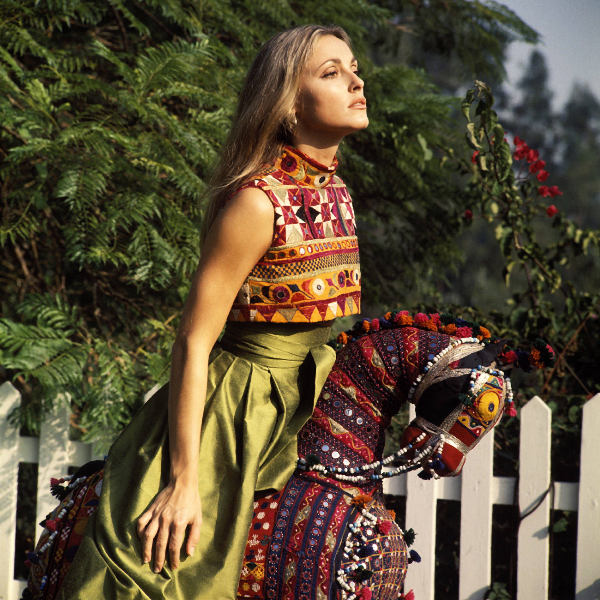 Sharon Tate, toy horse, vibrant patterned top, Full HD Desktop Wallpaper