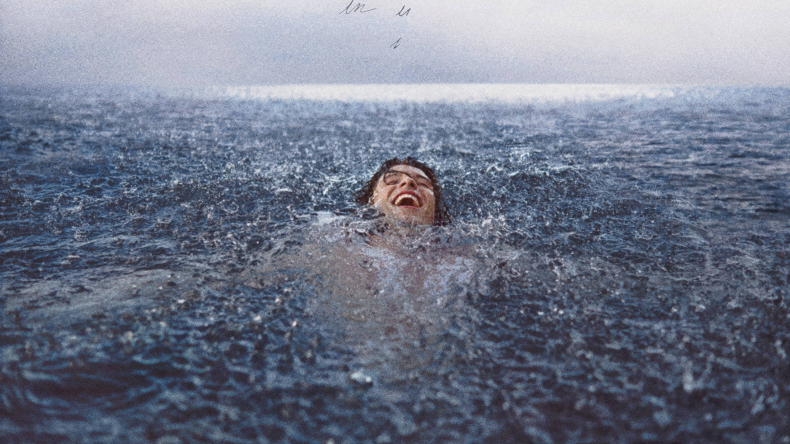 Shawn Mendes, blue ocean, overcast sky, 2K Desktop Wallpaper