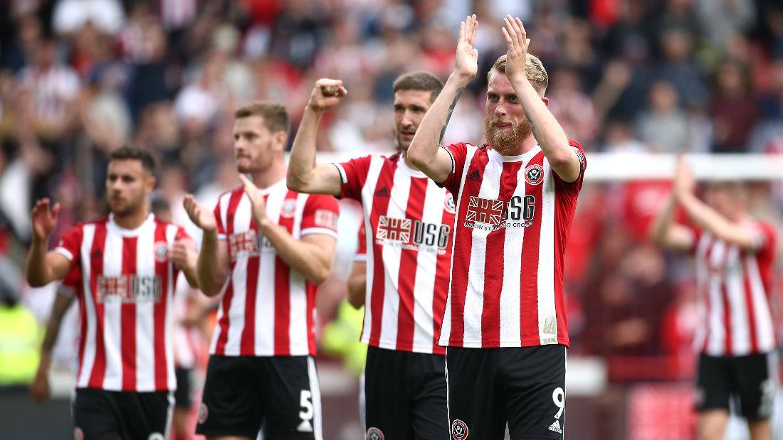 Sheffield United, red and white striped jerseys, sunlit stadium, SD Desktop Wallpaper