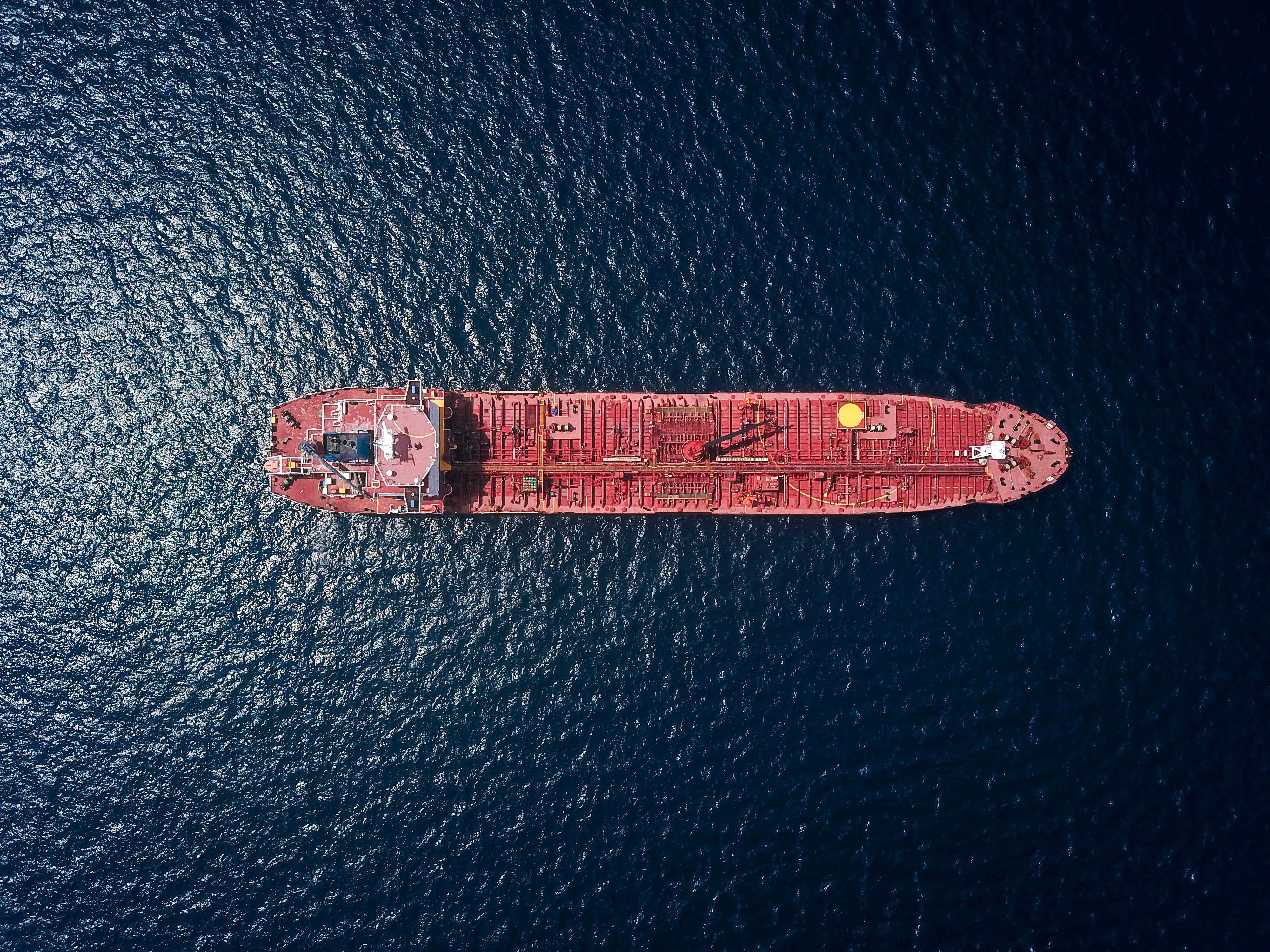 red oil tanker ship, deep blue ocean waters, bright sunlight, 4K Desktop Wallpaper