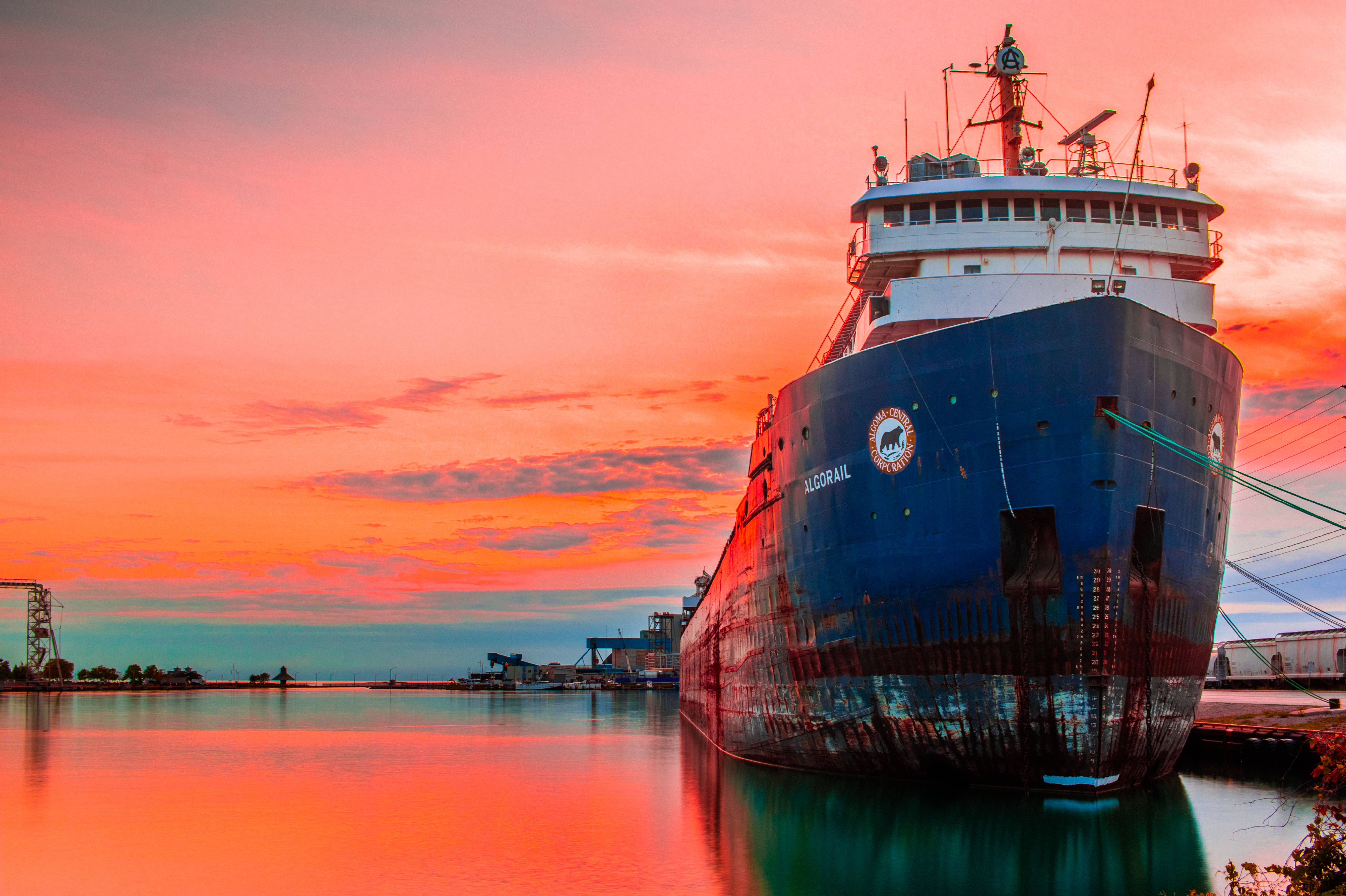 ALCOHAIL, blue cargo ship, orange and pink sunset, 5K Desktop Wallpaper