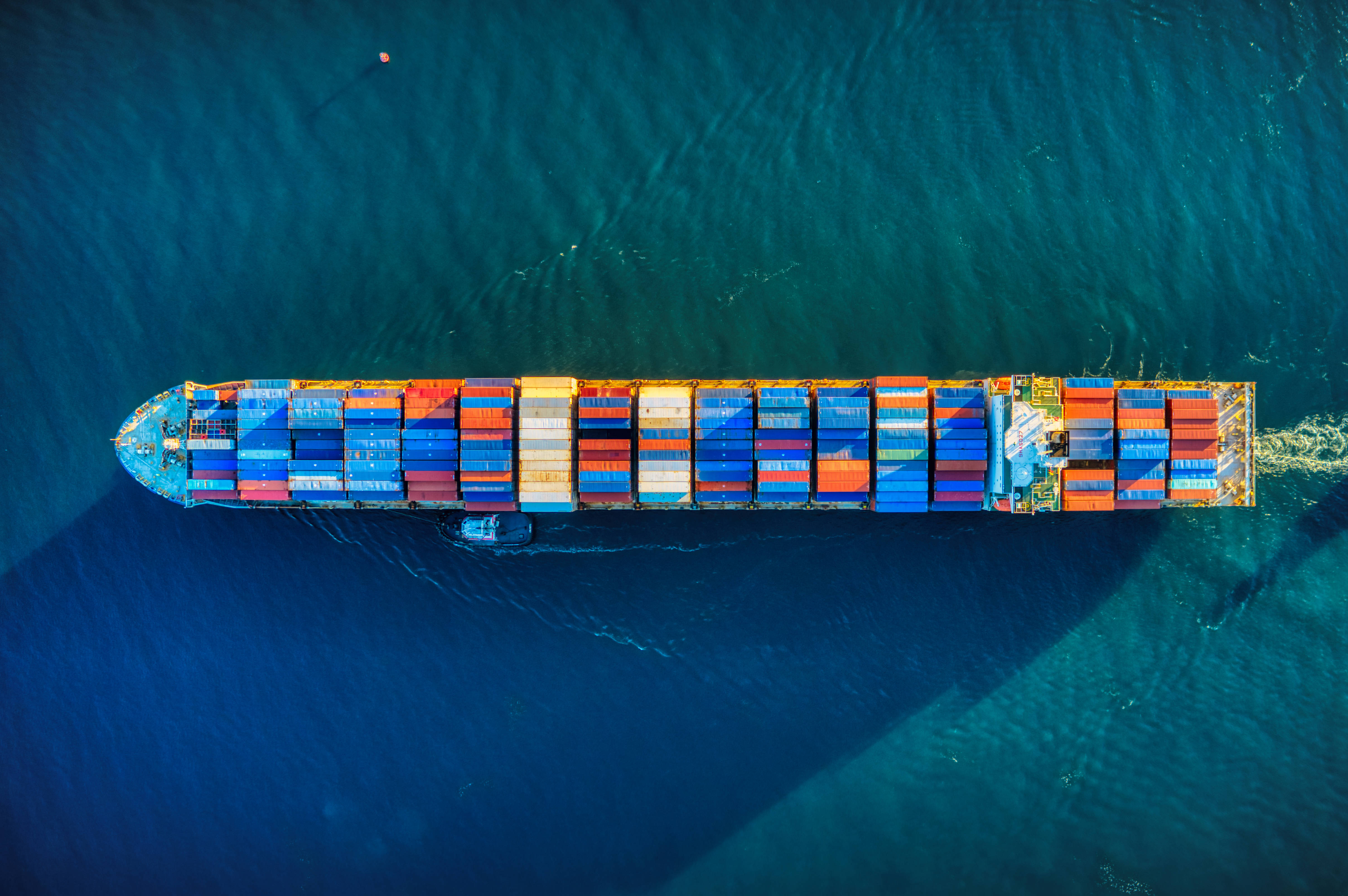 colorful cargo ship, container ship, deep blue ocean waters, 4K Desktop Wallpaper