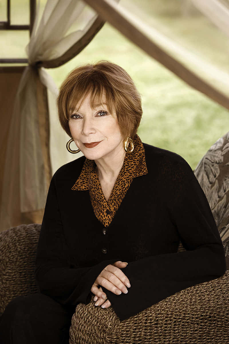 Shirley MacLaine, woven chair, black cardigan, SD Phone Wallpaper