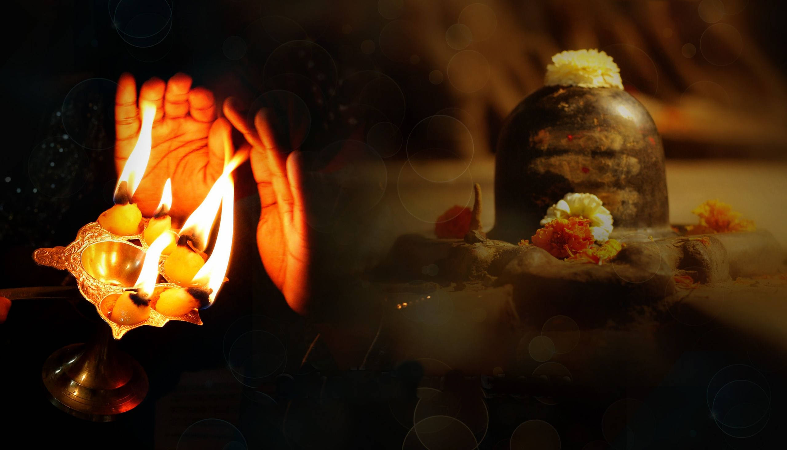 Shiva Lingam, glowing oil lamp, flowers, 2K Desktop Wallpaper
