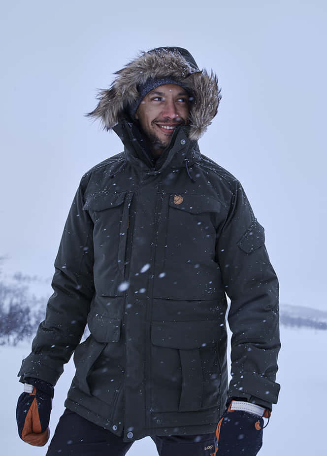 Shivering Man, dark winter coat, fur-lined hood, SD Phone Wallpaper