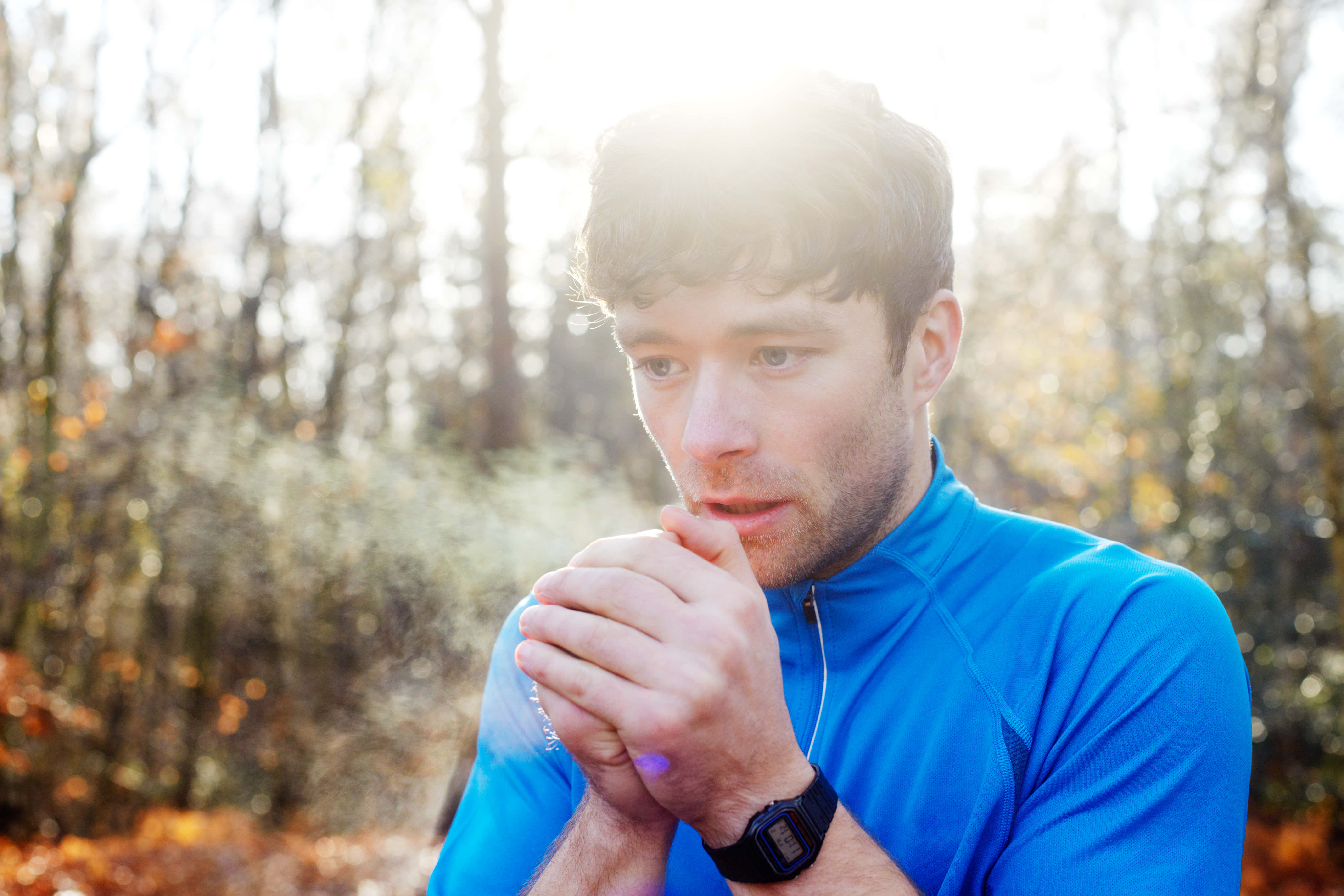 Shivering Man, blue running shirt, sunlit autumn forest, 5K Desktop Wallpaper