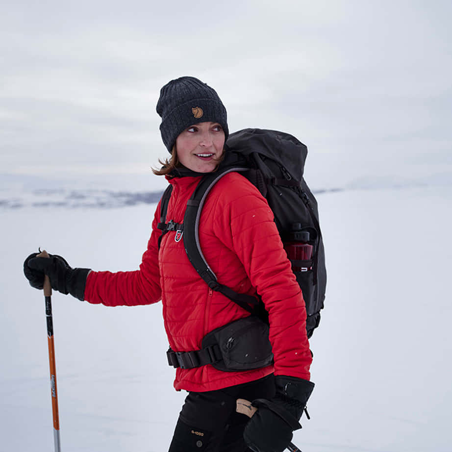 shivering woman, red jacket, black beanie, SD Desktop Wallpaper