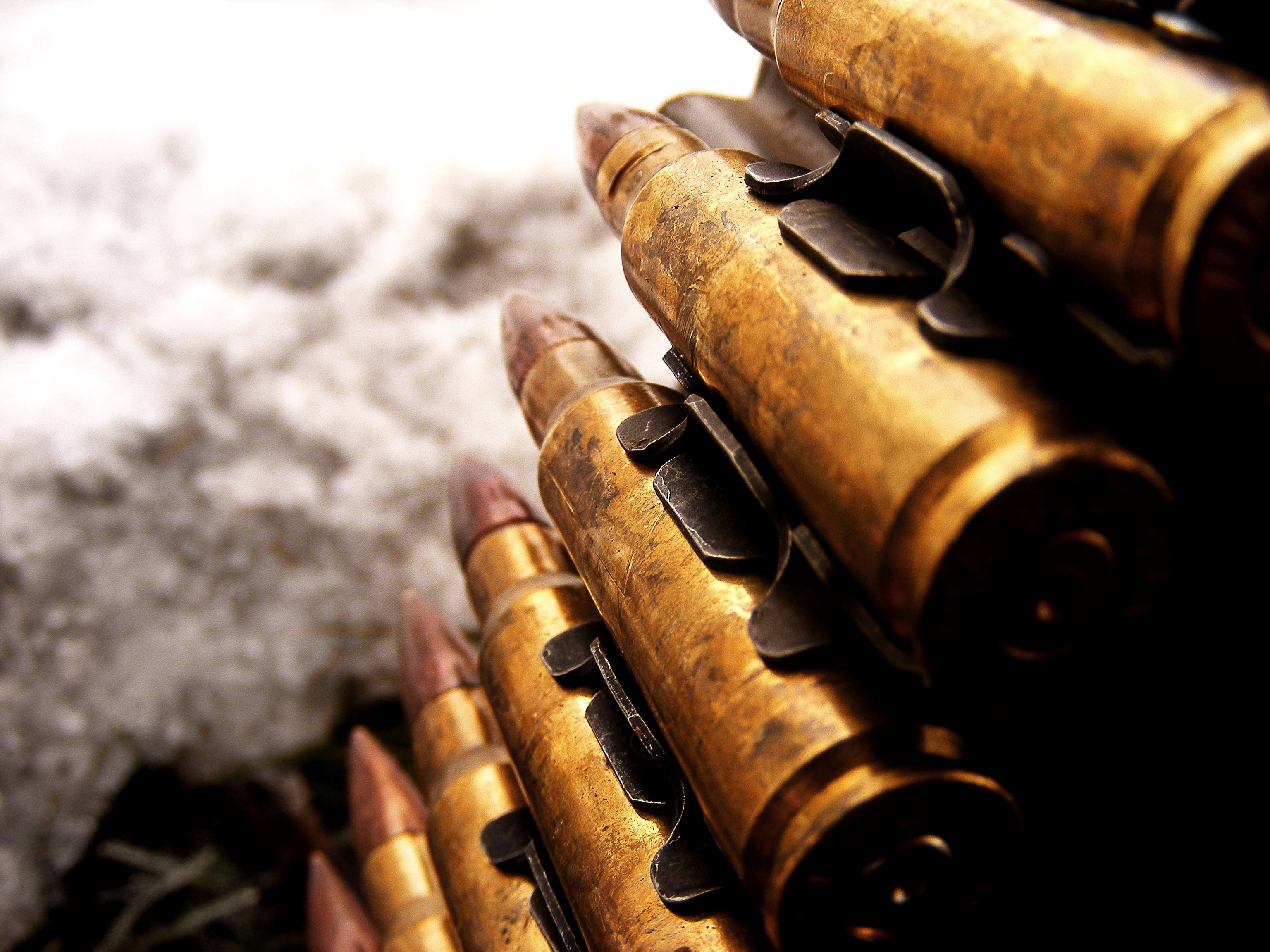 sharpshooter, brass rifle ammunition belts, snowy ground, 2K Desktop Wallpaper