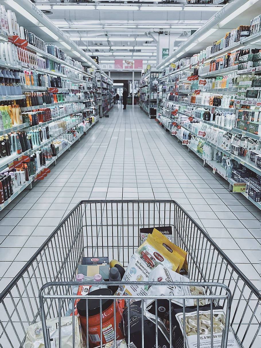shopping push cart, supermarket aisle, shelves of personal care products, SD Phone Wallpaper
