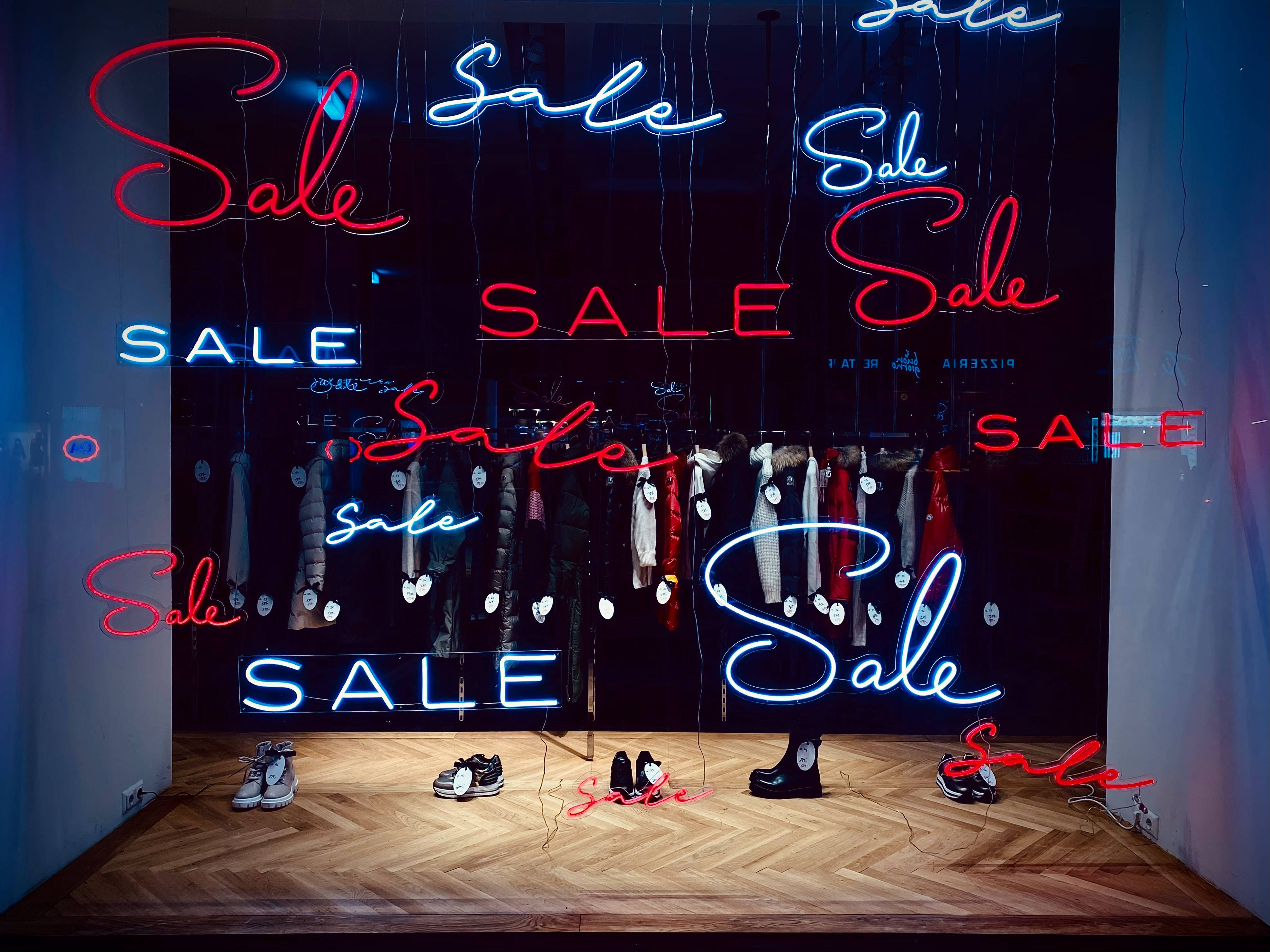 neon 'Sale' signs, red and blue neon, retail store window display, 4K Desktop Wallpaper