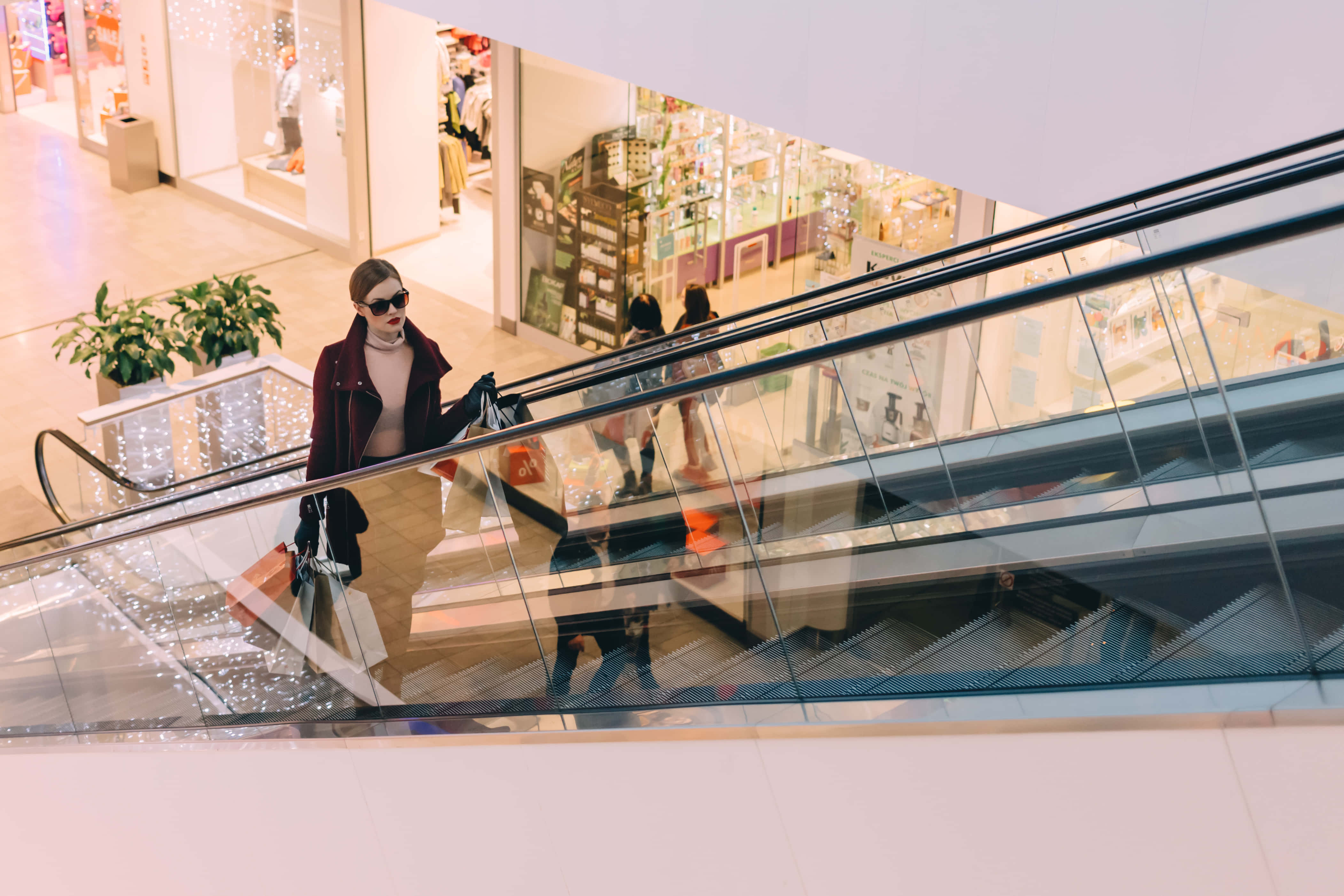 shopping mall, glass-enclosed escalator, sunglasses, 4K Desktop Wallpaper