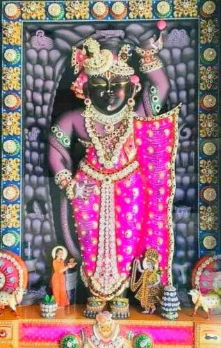 Shrinathji, pink robe, dark-skinned deity, SD Phone Wallpaper