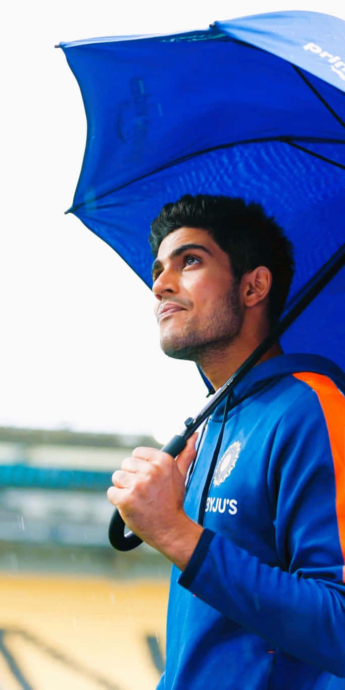 Shubman Gill, blue sports jacket, blue umbrella, HD Phone Wallpaper