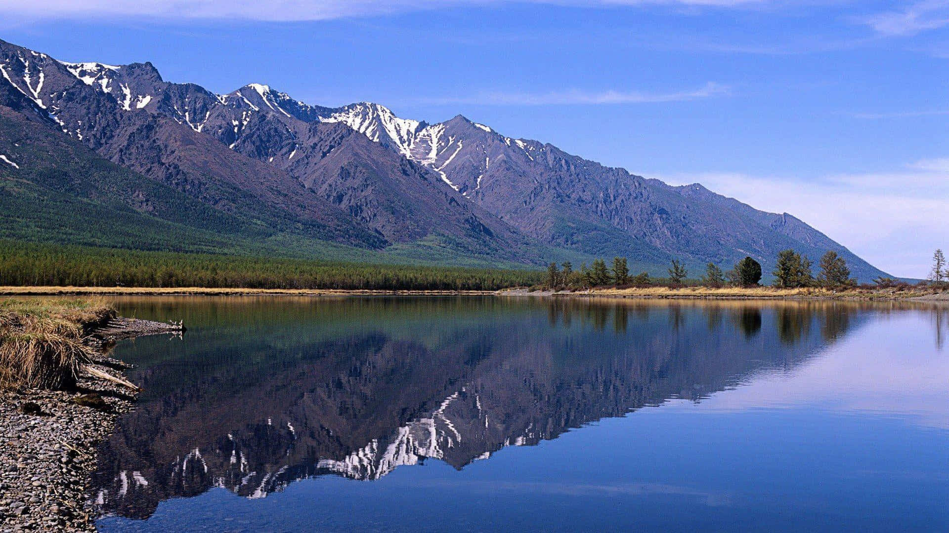 frozen siberian wilderness, snow-capped mountains, calm lake, Full HD Desktop Wallpaper