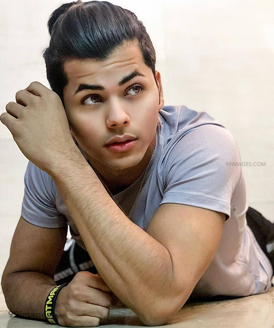 Siddharth Nigam, dark hair, topknot, SD Phone Wallpaper