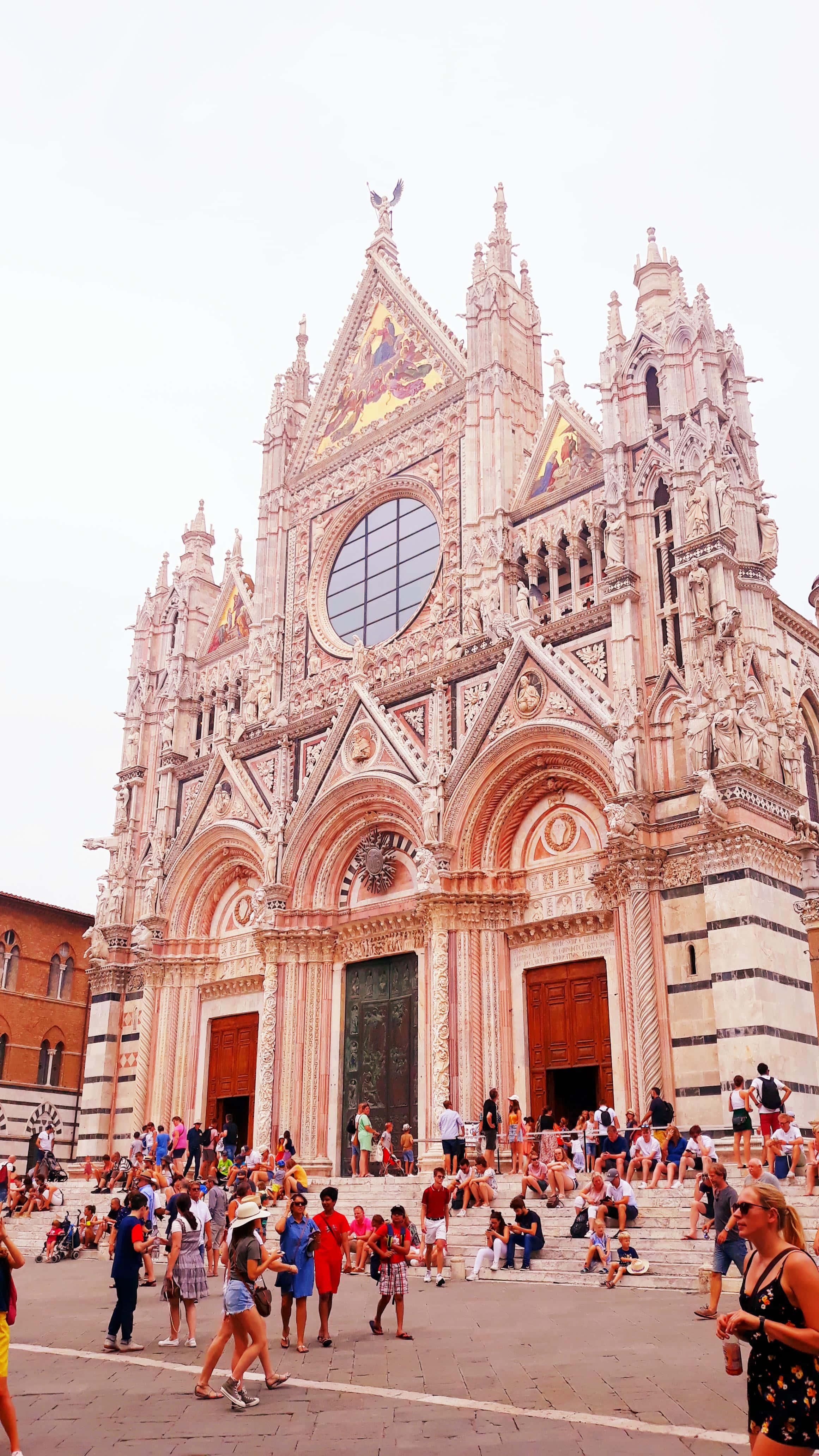 Siena Cathedral, intricate stone carvings, large rose window, 4K Phone Wallpaper