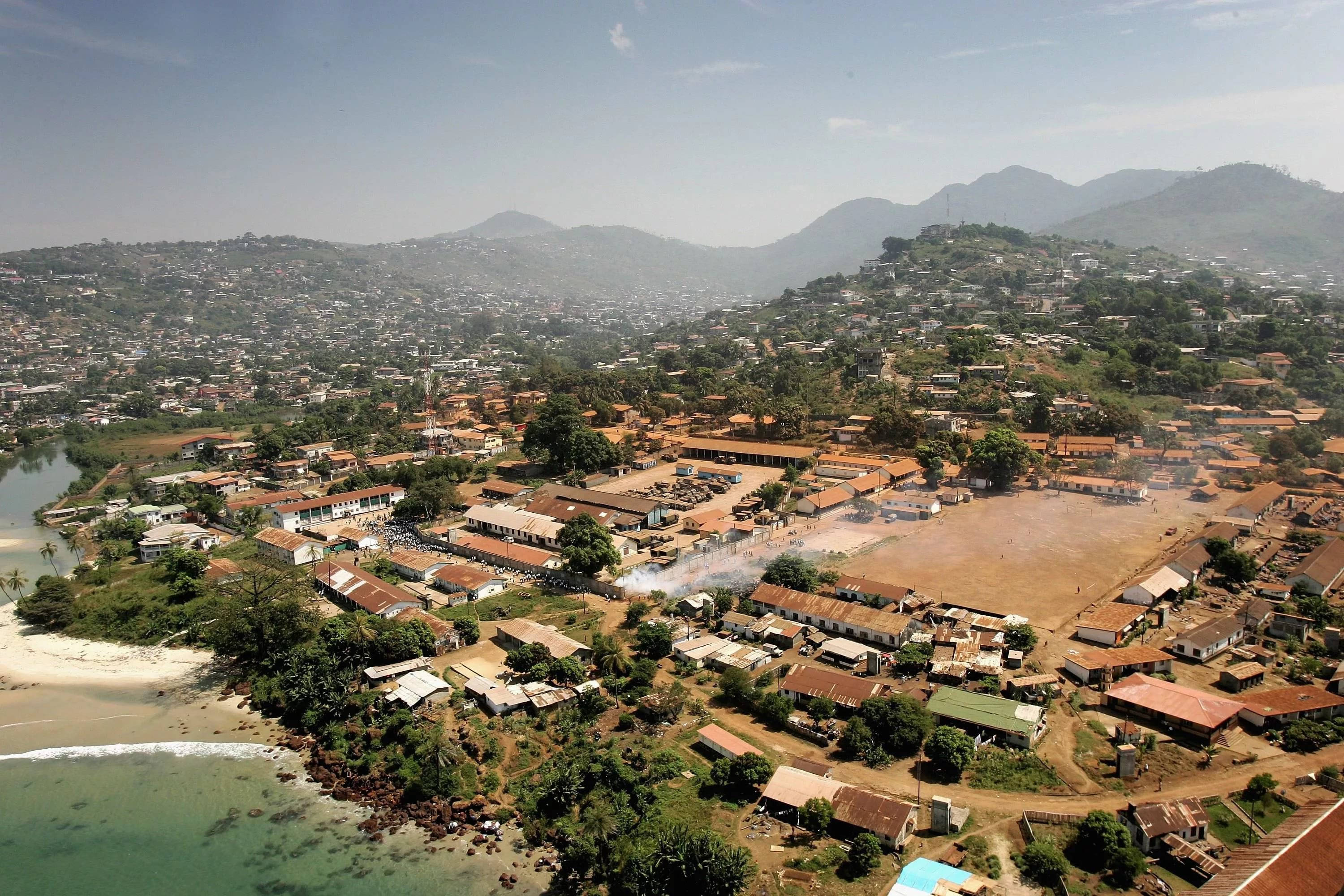 Sierra Leone, coastal town, terracotta-roofed houses, 2K Desktop Wallpaper