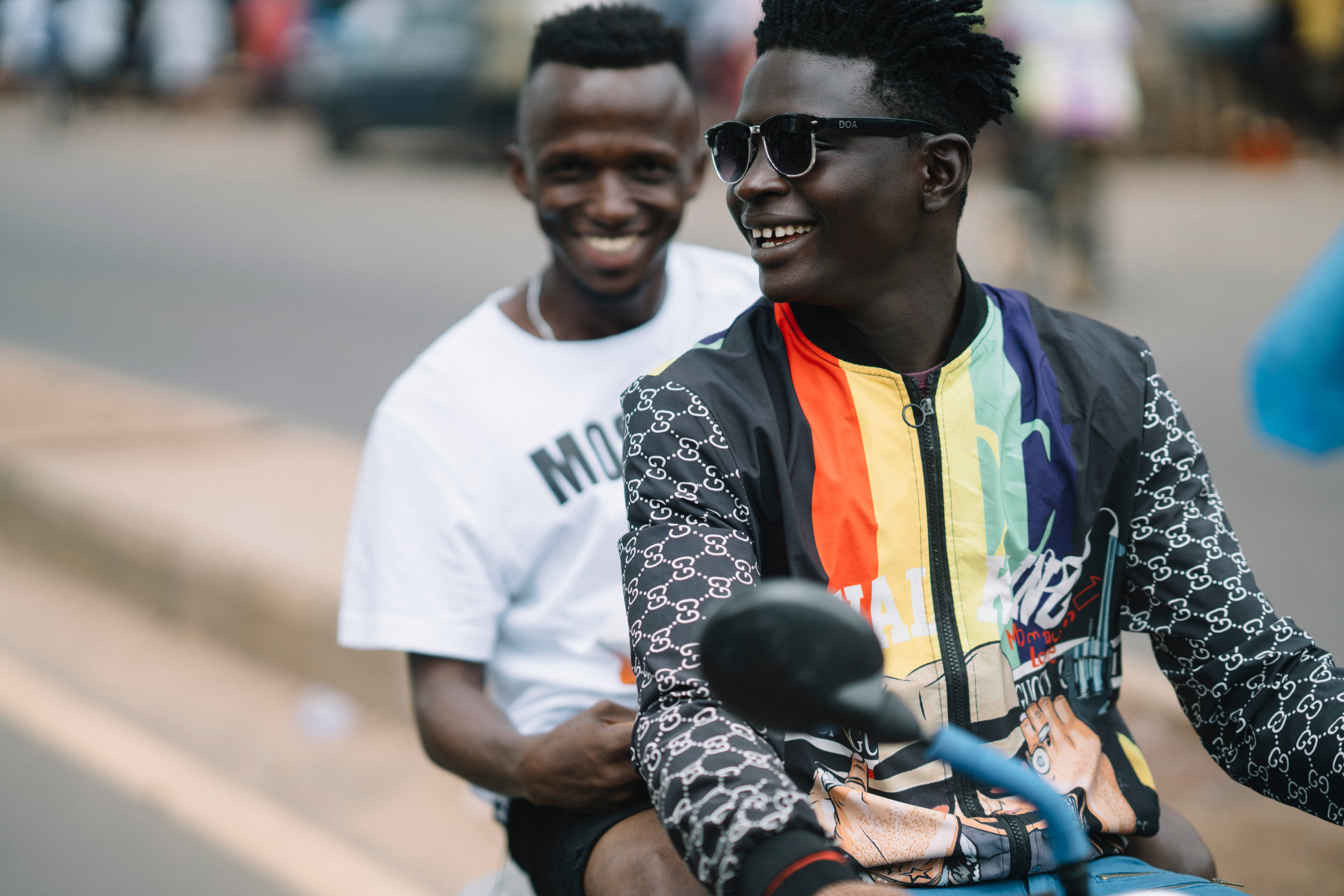 motorcycle, Sierra Leone, bustling urban street, 8K Desktop Wallpaper