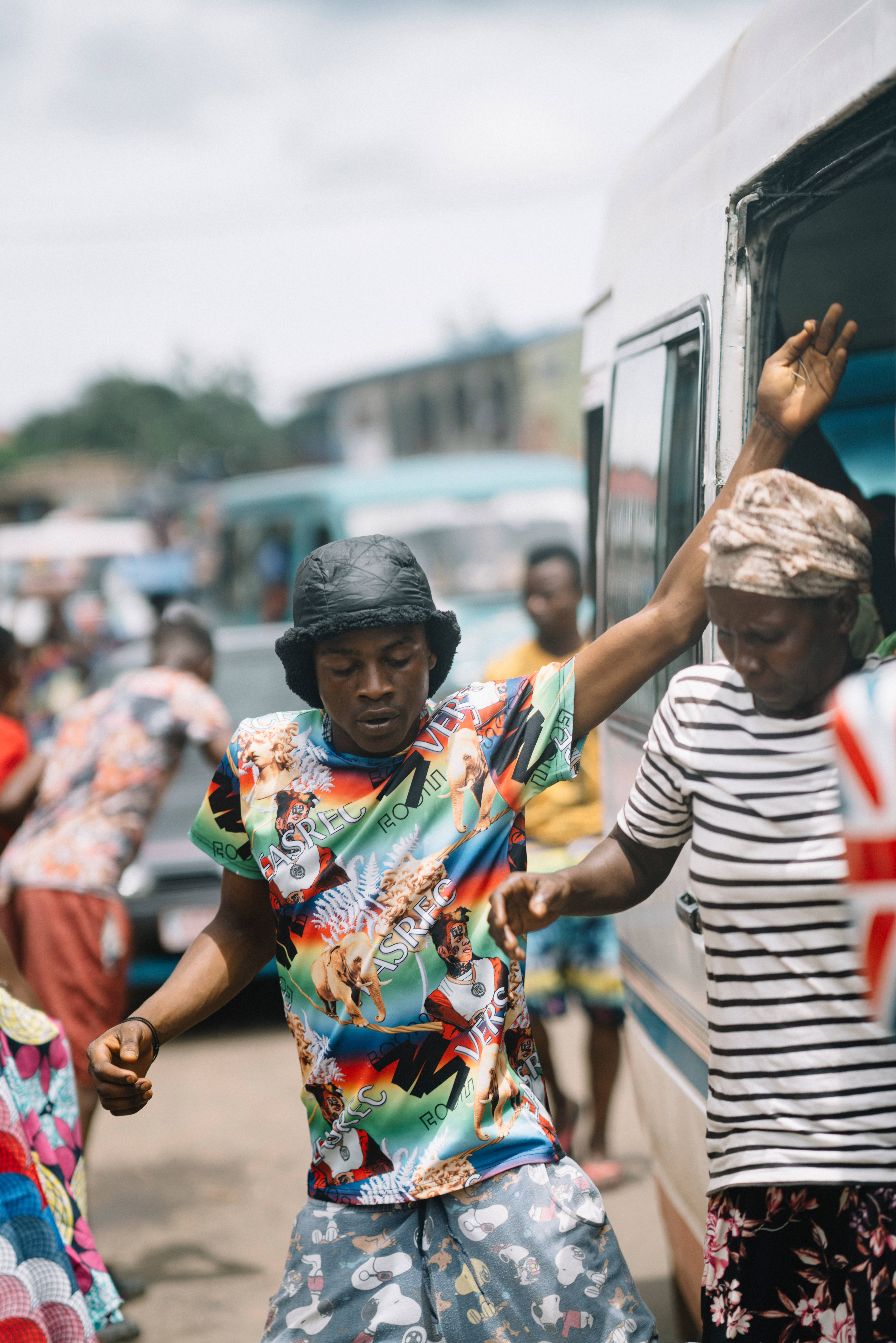 Sierra Leone, white bus, vibrant patterned shirt, 8K Phone Wallpaper