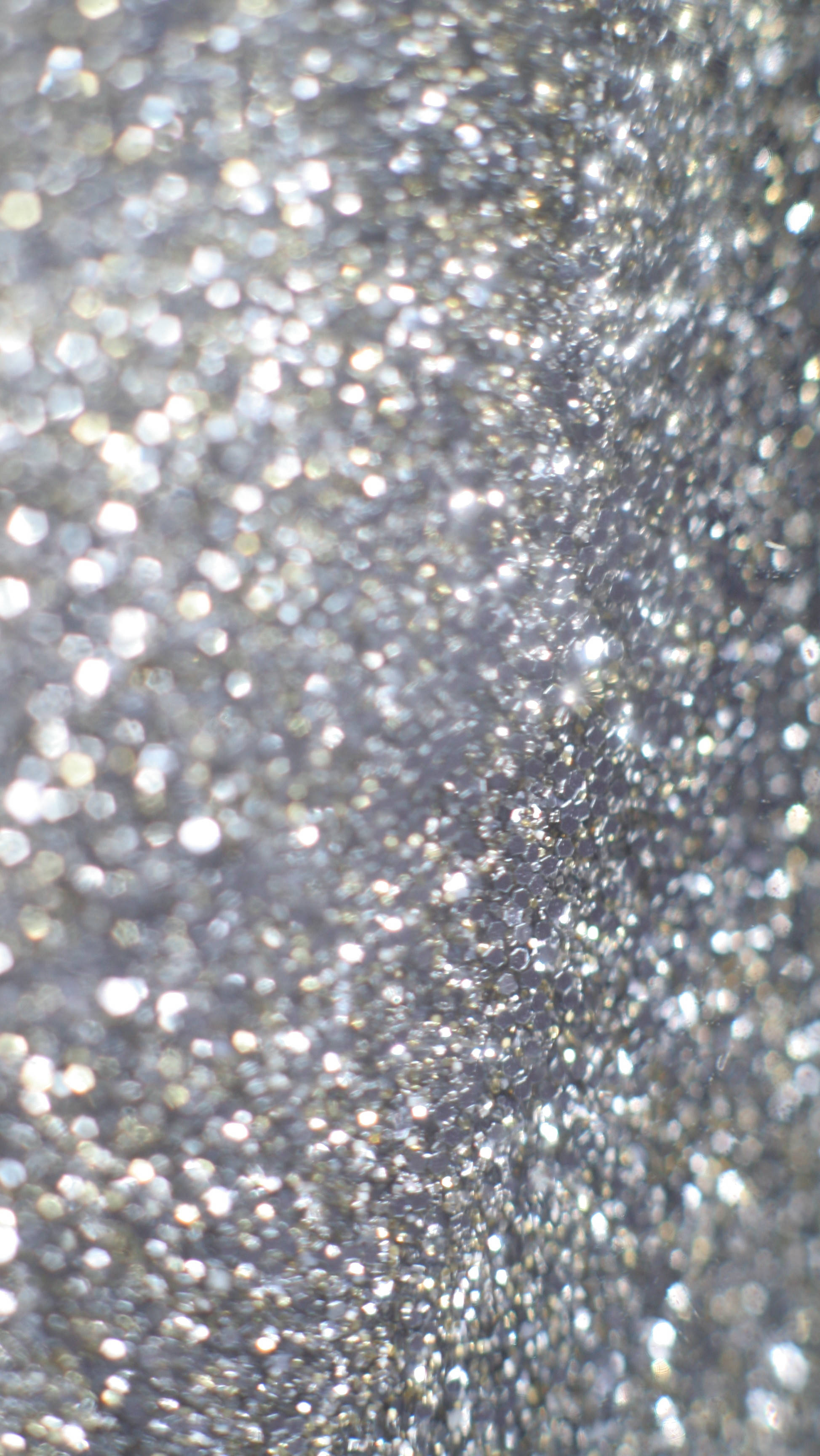 silver glitter, shimmering silver glitter particles, bokeh highlights, 2K Phone Wallpaper