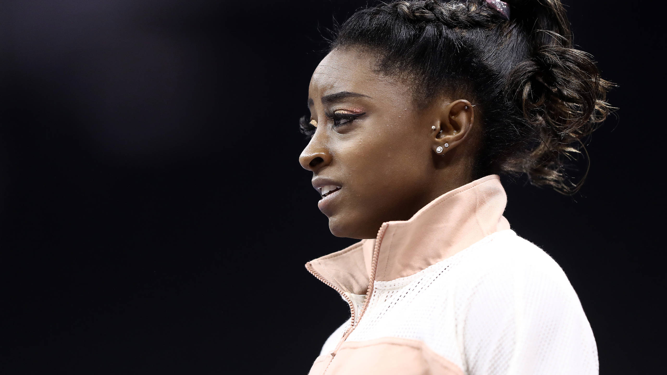Simon Biles, pink and white athletic jacket, side profile, 2K Desktop Wallpaper