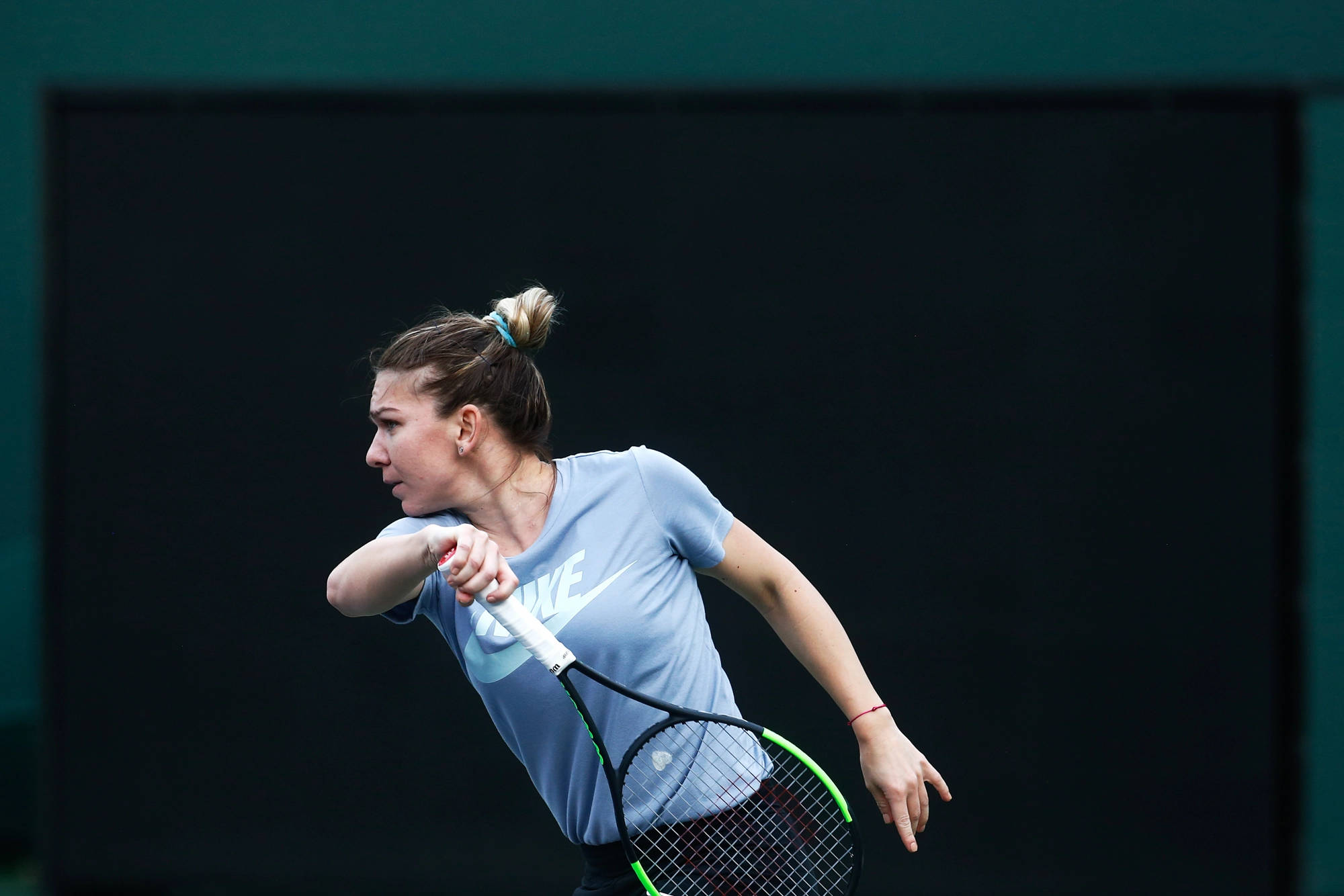 Simona Halep, light blue Nike shirt, dark green wall, Full HD Desktop Wallpaper