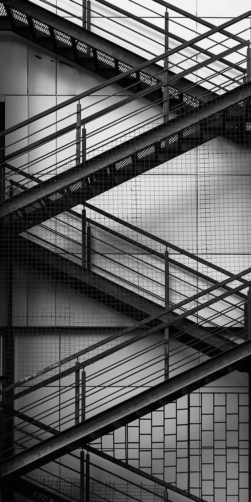 minimalist black and white, architectural shot, intersecting metal staircases, HD Phone Wallpaper