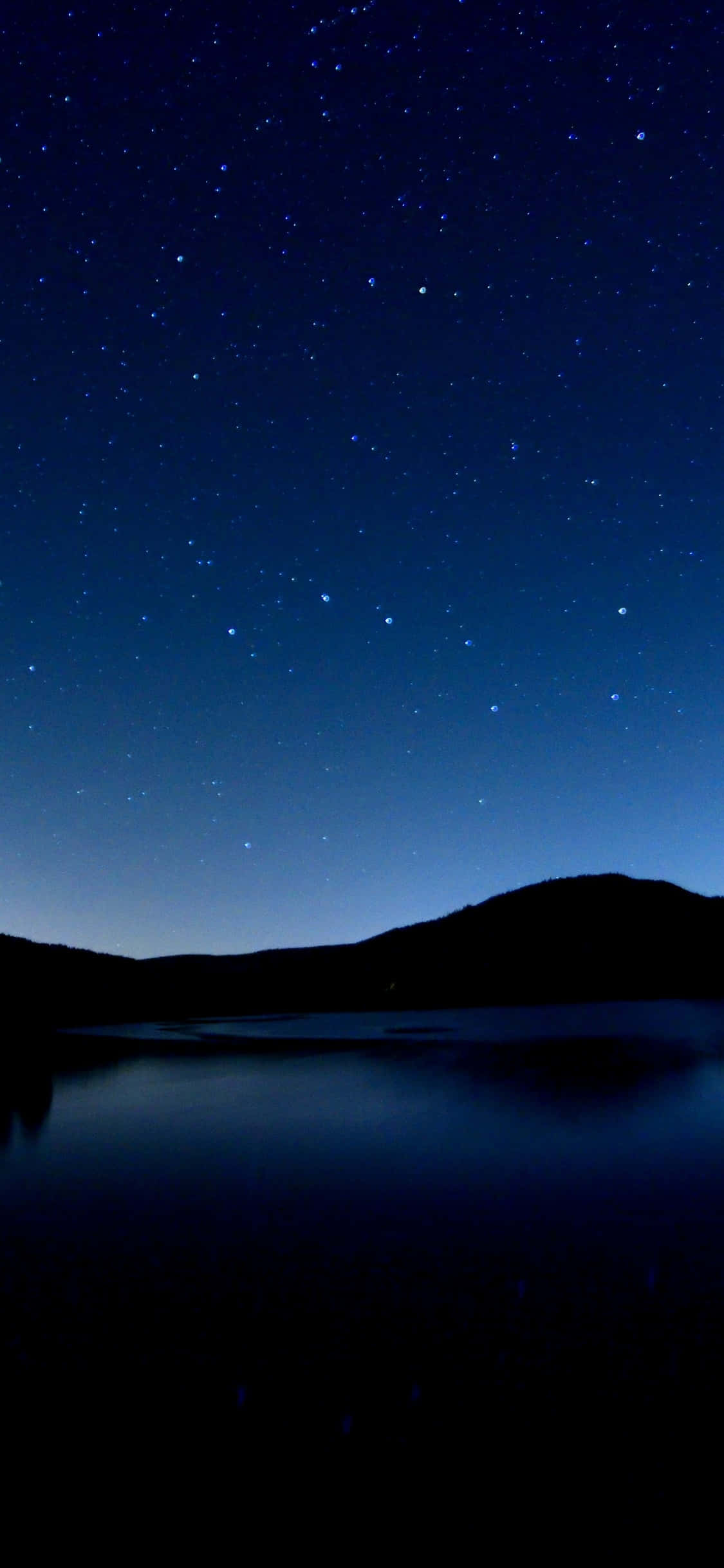 solid blue iPhone, starry night sky, calm lake, Full HD Phone Wallpaper