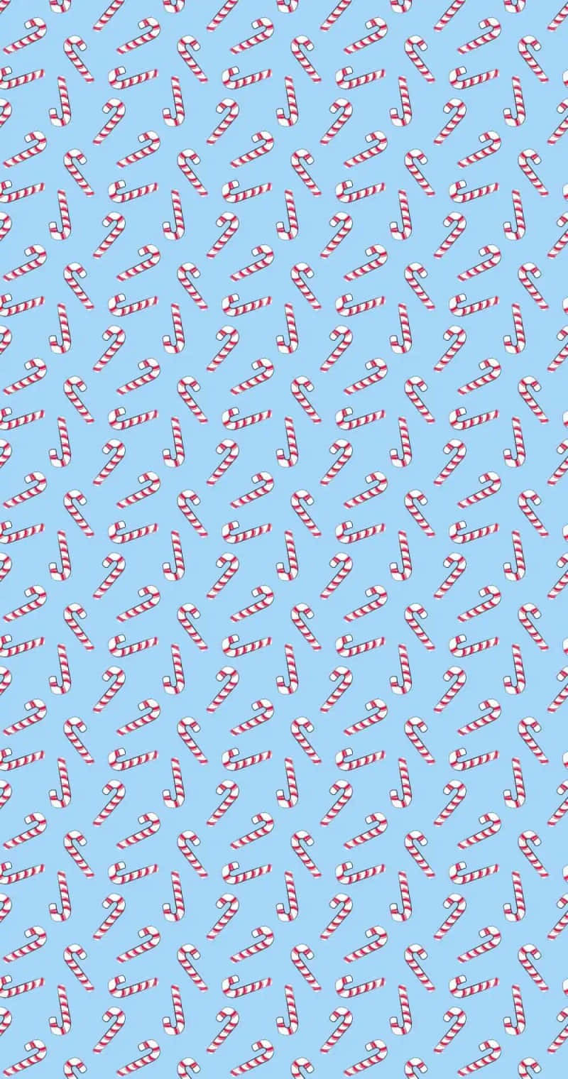 red and white striped candy canes, soft blue background, Christmas display, HD Phone Wallpaper