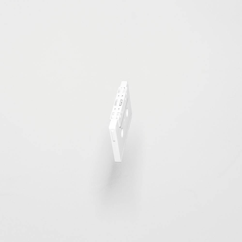 Simple Clean, white cassette tape, plain white surface, SD Desktop Wallpaper