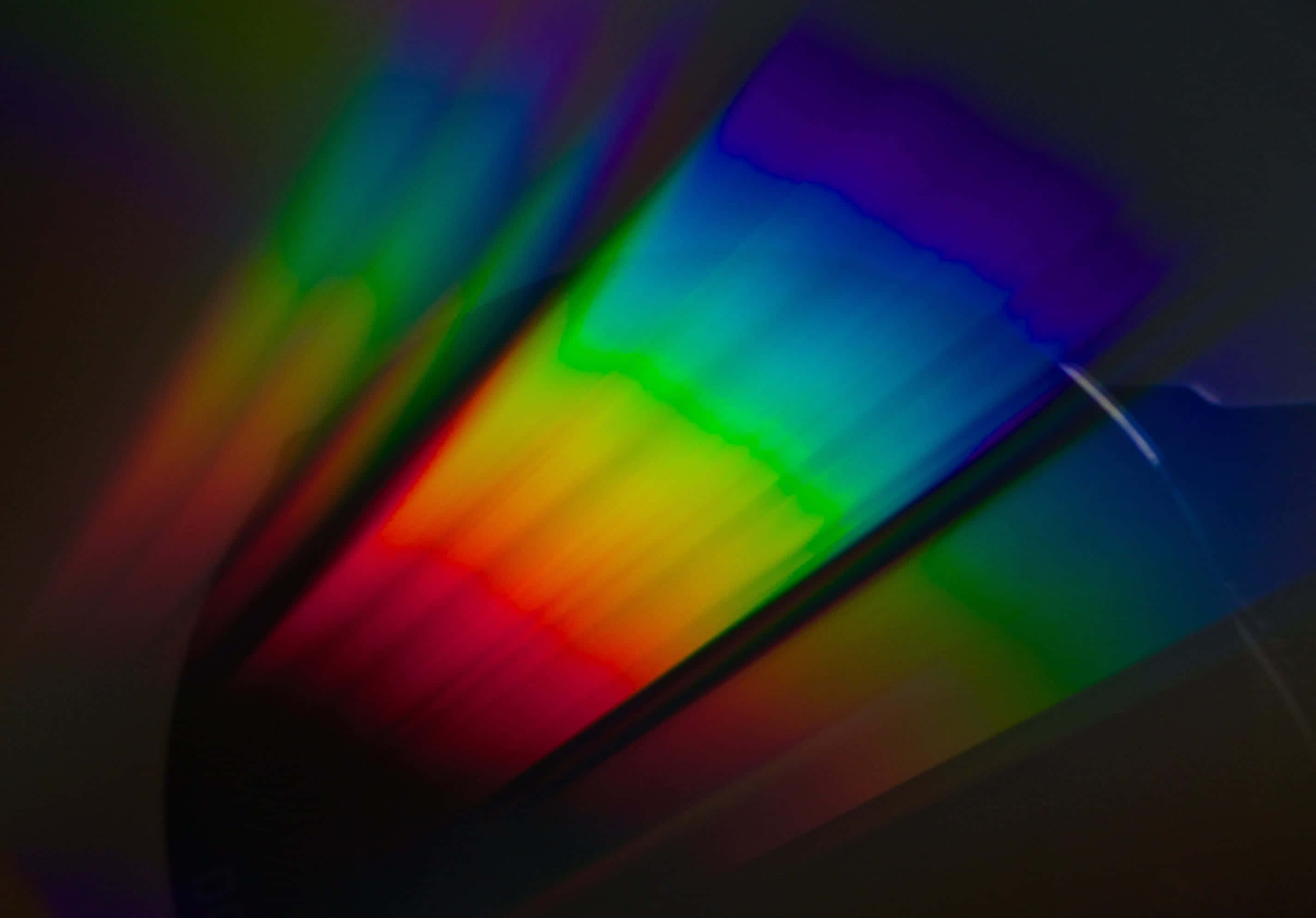 abstract color spectrum, rainbow light streaks, dark surface, 2K Desktop Wallpaper